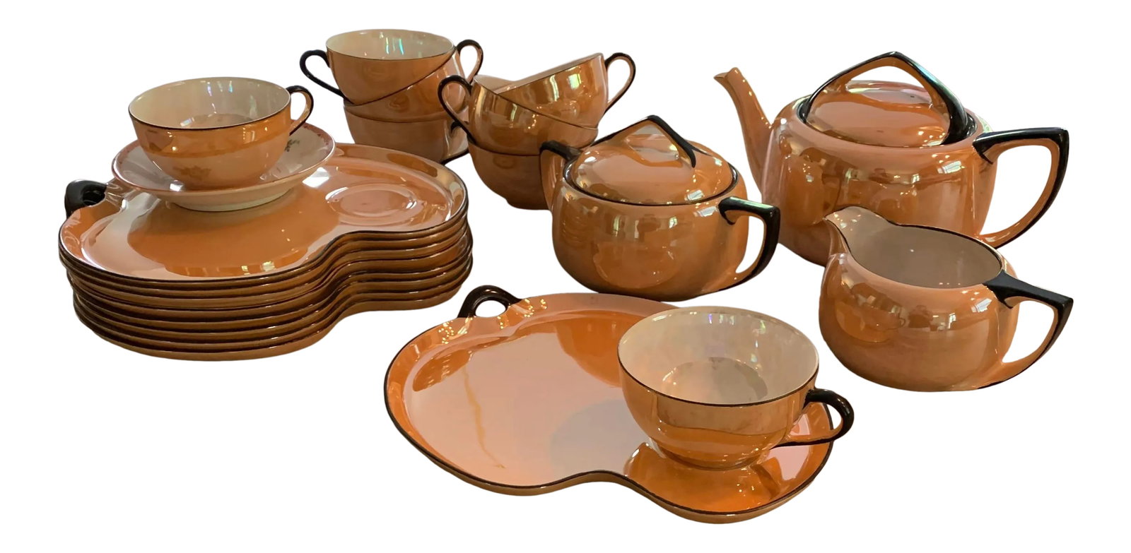 Vintage Noritake Hand-Painted Lustreware Tea Set for 8- 22 Pieces: Elegant hand-painted vintage Noritake tea set for 8. A beautiful set in pale peach with a subtle pearlescent gleam (most notable inside) and glossy black accent border. Included are 8 saucers/snack