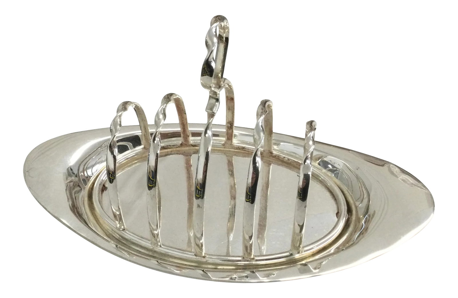 English Four Slice Silver Plate Toast Rack: English Four Slice Silver Plate Toast Rack 8"long x 4'wide x 5" tall Condition: Alterations: Original Condition Unaltered Imperfections: Some Imperfections Condition Notes: Very Good Condition