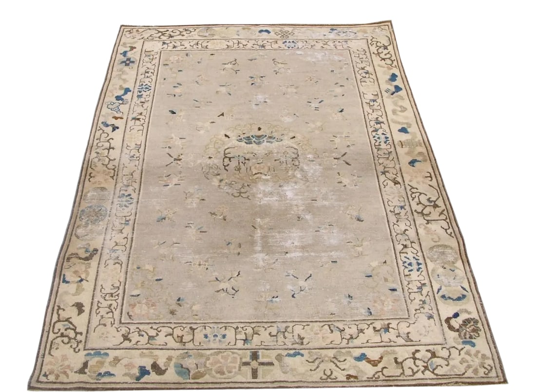 1910s Antique Worn Chinese Rug - 8'6'' X 5'9'': Antique Chinese Rugs, as opposed to most of the antique rug productions, were woven almost exclusively for internal consumption. Since they were mostly sheltered from European and Western influences,