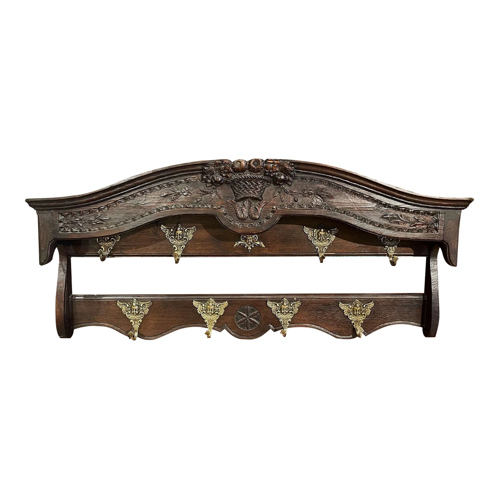 Mid-19th Century French Carved Oak Hanging Shelf With Hooks From Normandy: Hang pots and other kitchen utensils on this elegant antique shelf. Crafted in Normandy, France circa 1860, the Louis XV wall hanging piece features a bonnet top decorated with a beautiful hand carved