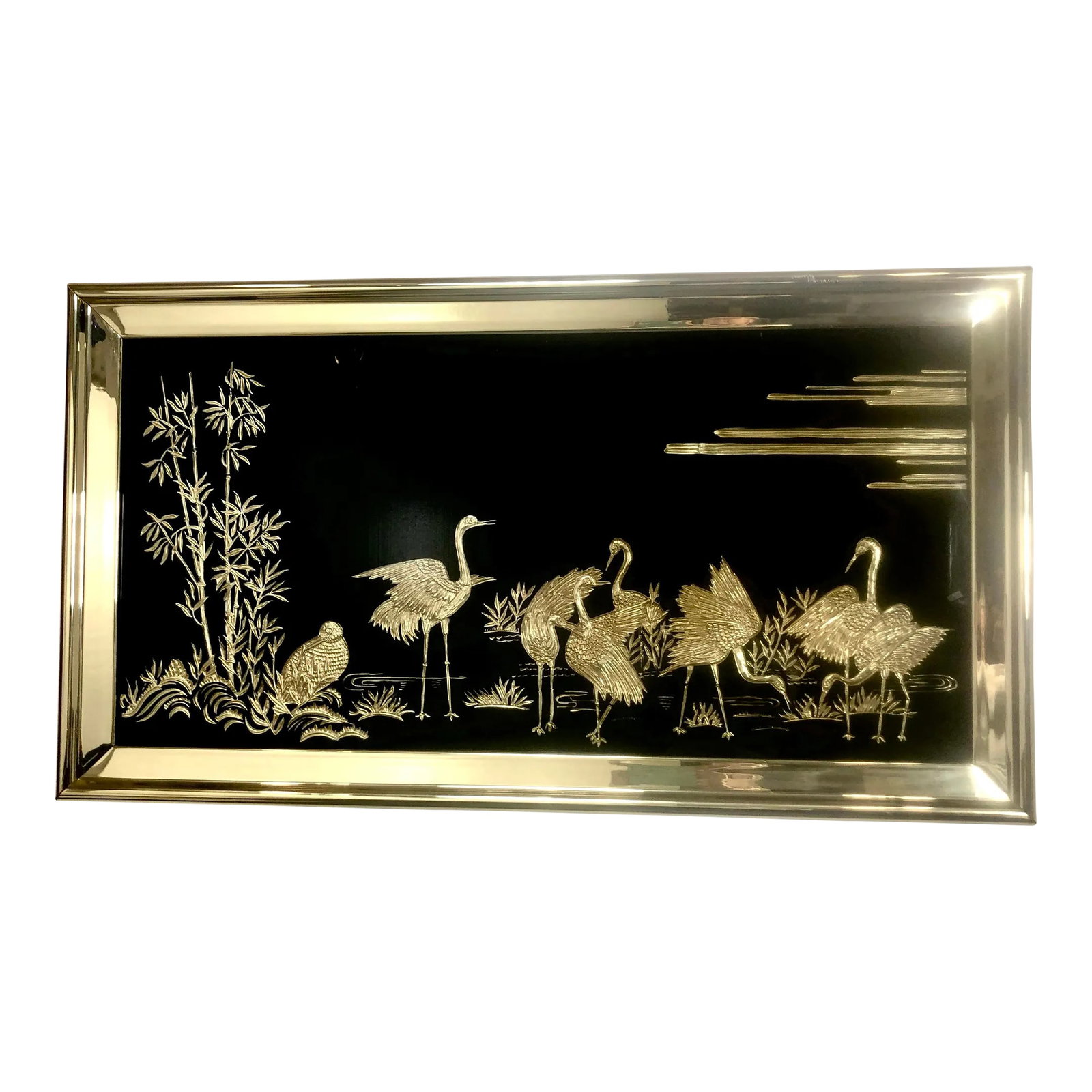 1960s Large Black Glass Chinoiserie Wall Art With Gold Herons: Large, elegant, framed black glass is etched with gold tone metal applique to create a serene scene of golden herons, egrets, cranes near bamboo lined coast. Condition: Alterations: Original Condition