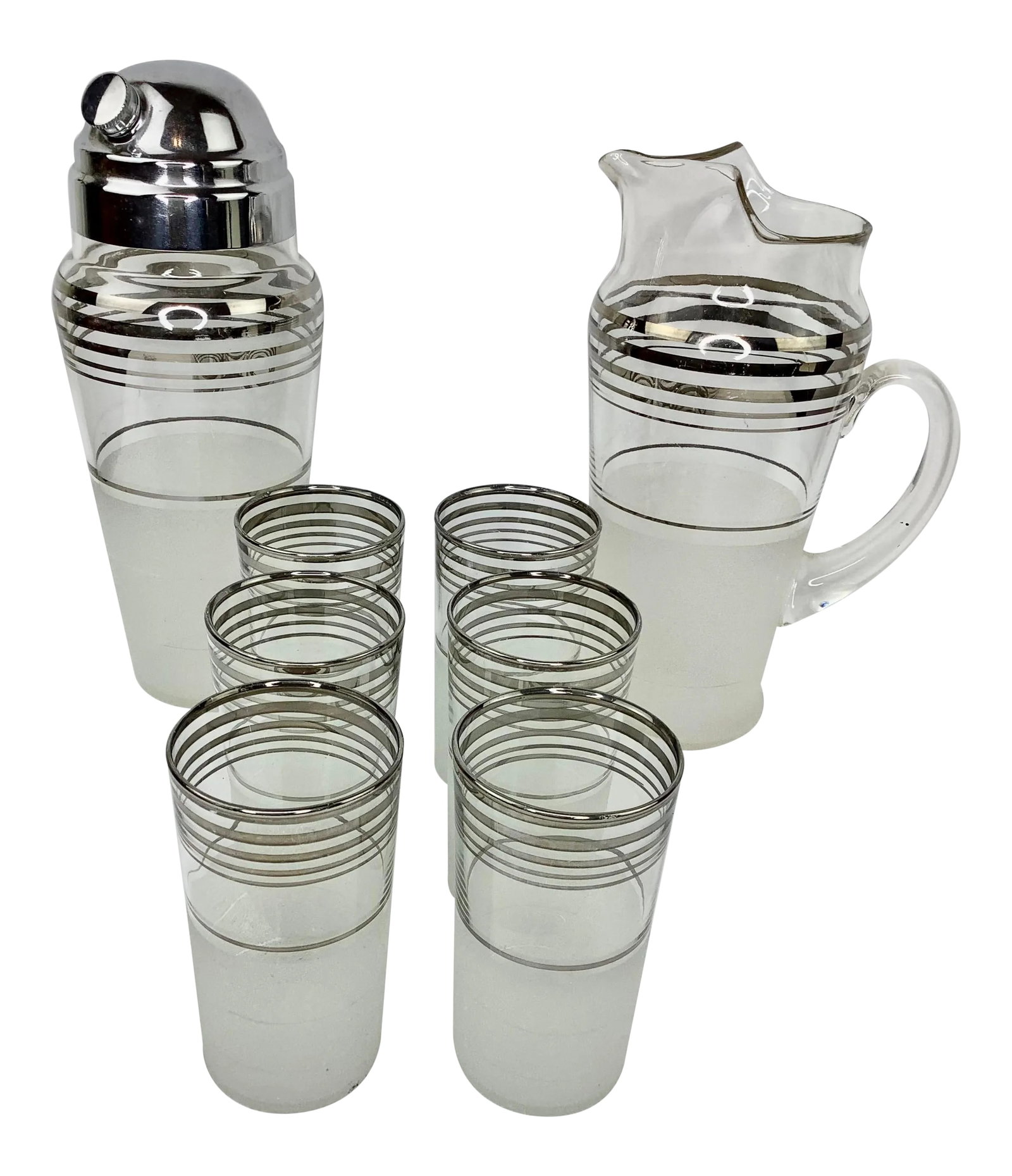Vintage Art Deco Cocktail Set: Vintage Art Deco Cocktail Set with Pitcher, Large Shaker, and 6 Highball Glasses. Each piece has silver bands on clear glass above a frosted glass lower section. Glasses measure 4 3/4" high x 2 1/2" a