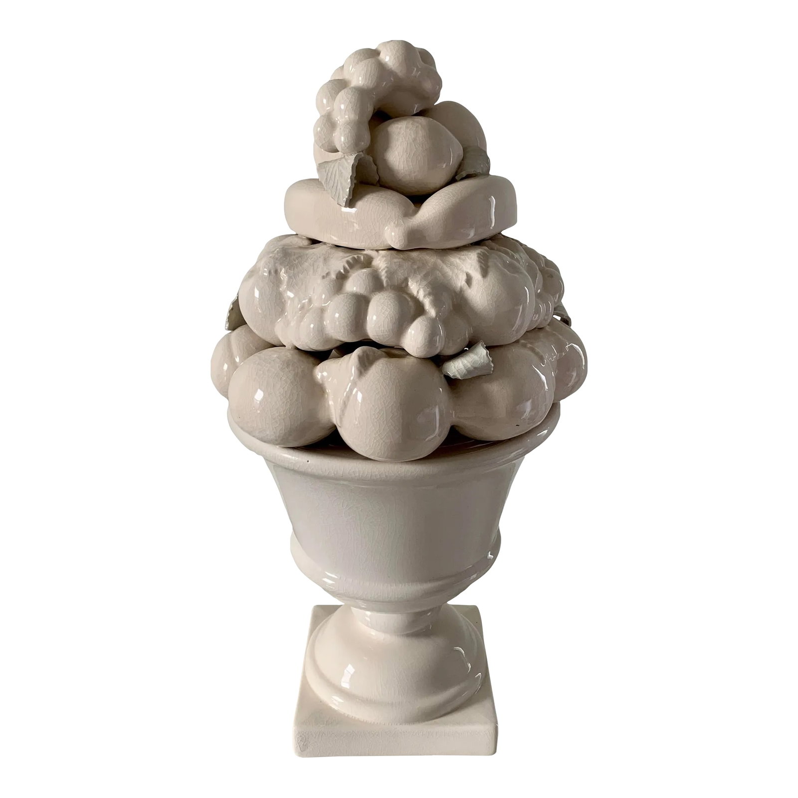 Mid-Century White Glazed Ceramic Fruit Topiary: An elegant mid-20th century white glazed ceramic fruit topiary featuring an abundant arrangement of sculpted fruit overflowing from a classical urn. Executed in crisp monochromatic glaze, the trompe l