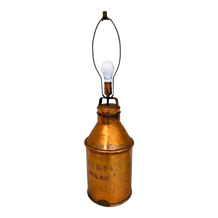Vintage Americana Late 20th Century Steel With Brass Finish CC & Ba Milk Jug Table Lamp: Vintage CC&BA (California Cheese & Butter Association) steel and brass finish milk jug table lamp. Perfect for a country farmhouse-style home. Condition: Alterations: Original Design Modified Imperfec
