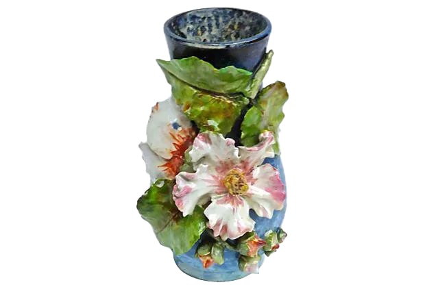 Antique Barbotine Majolica Floral Vase: Antique; 19th century, French, Barbotine, Majolica, floral vase with hand-crafted and hand-painted hollyhock floral design in three-dimensional relief. Hand-painted blue and white mottled background.