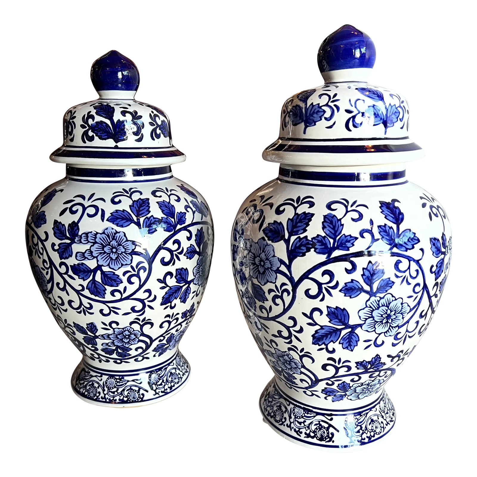 1990s Blue and White Ginger Jars - Set of 2: Blue and White Pair of Ginger Jars comes in a Traditional Pattern sure to add a nice Touch to any room . Condition: Alterations: Original Condition Unaltered Imperfections: Some Imperfections Conditio