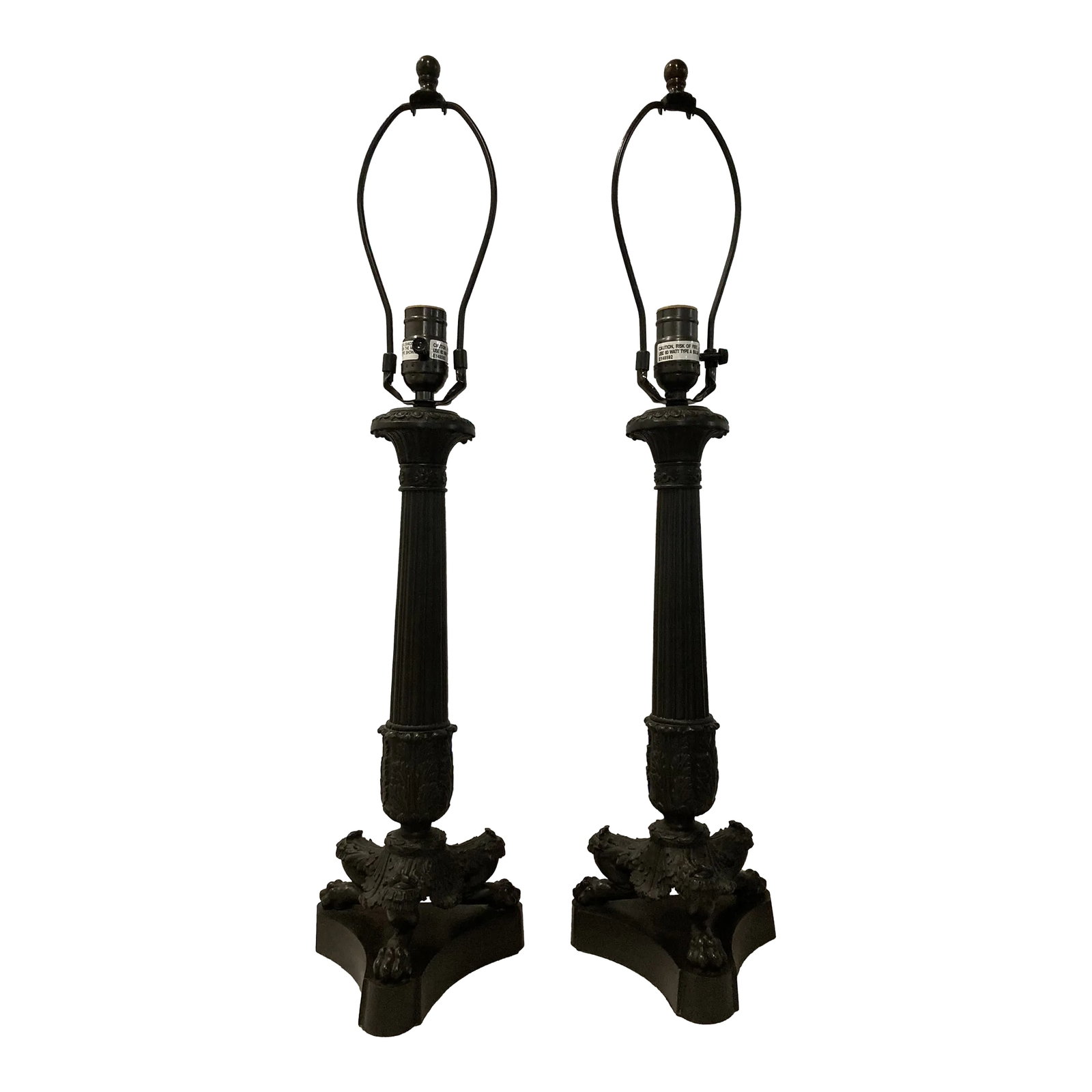 Early 21st Century Vaughan Traditional English Table Lamps - a Pair: Vaughan Solid Bronze table lamps. Lamps have a fluted bronze stem resting on a tripod footed base. Condition: Alterations: Original Condition Unaltered Imperfections: Some Imperfections Condition Note