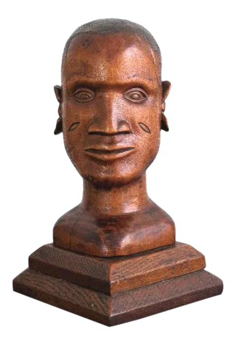 American Folk Art Hand Carved Pine Bust of an Gold Coast African Man Dated 1936: A wonderful hand carved bust of an african man from the gold coast which was completed in 1936. This piece of american folk art is highly unusual in that it depicts an african man. The bust is carved