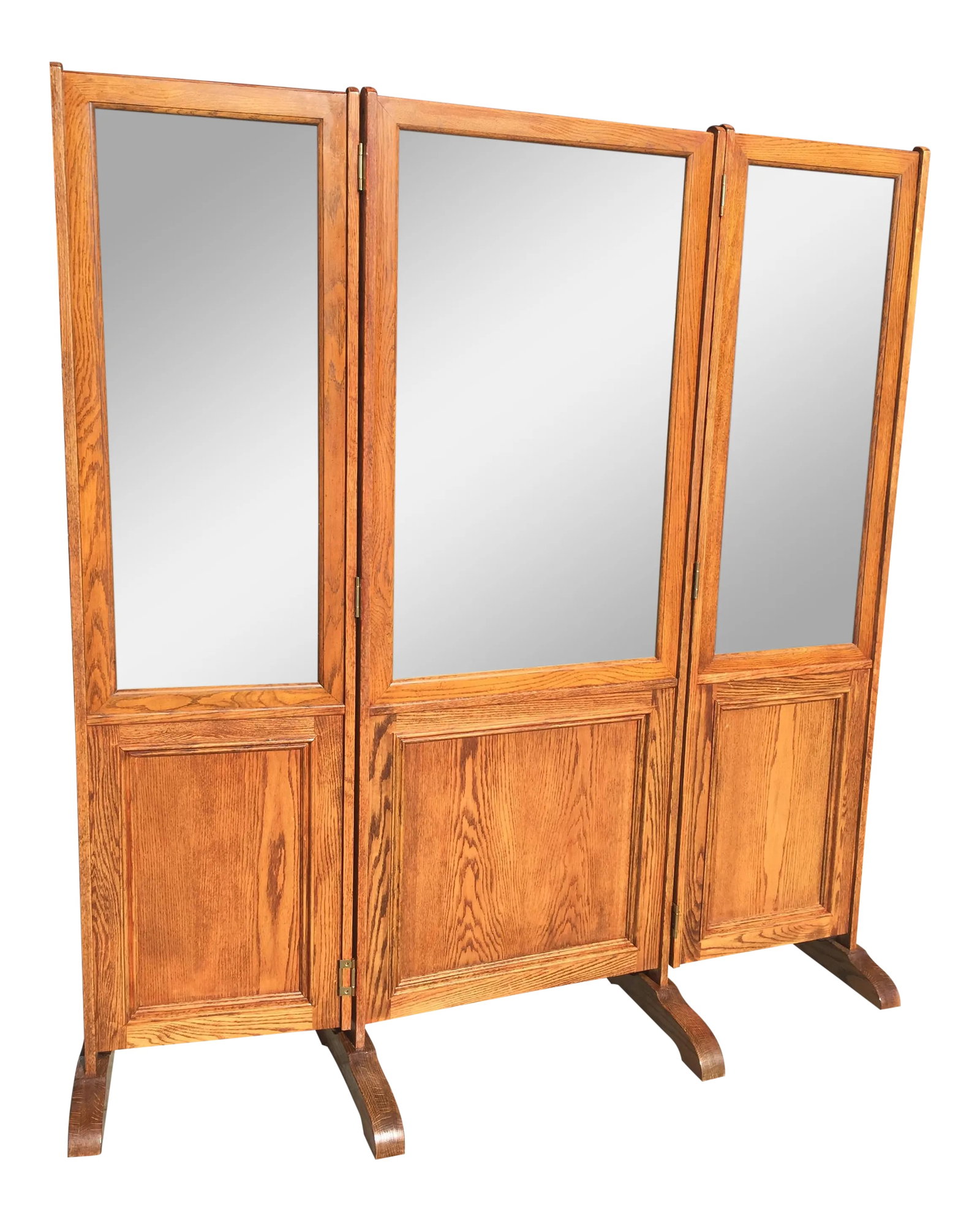 Oak Trifold Mirror Dressing Mirror: Large solid Oak trifold dressing mirror. In excellent condition. 20th century. This has beveled glass and butterfly hinges. The center section is stationary with adjustable feet, the two ends have