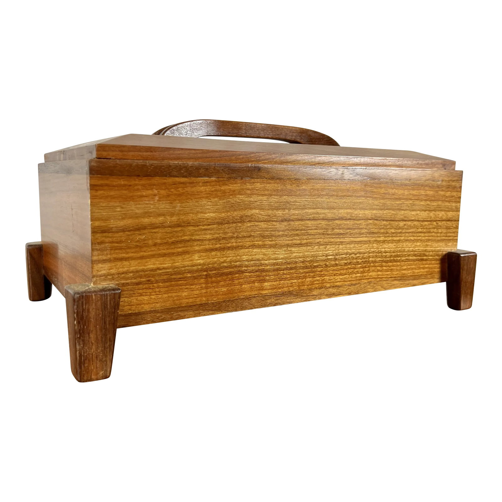 Modernist Teak Jewelry Box: Beautiful floating teak jewelry box with sculptural handle and tapered legs. Condition: Alterations: Original Condition Unaltered Imperfections: Some Imperfections Condition Notes: Good condition.