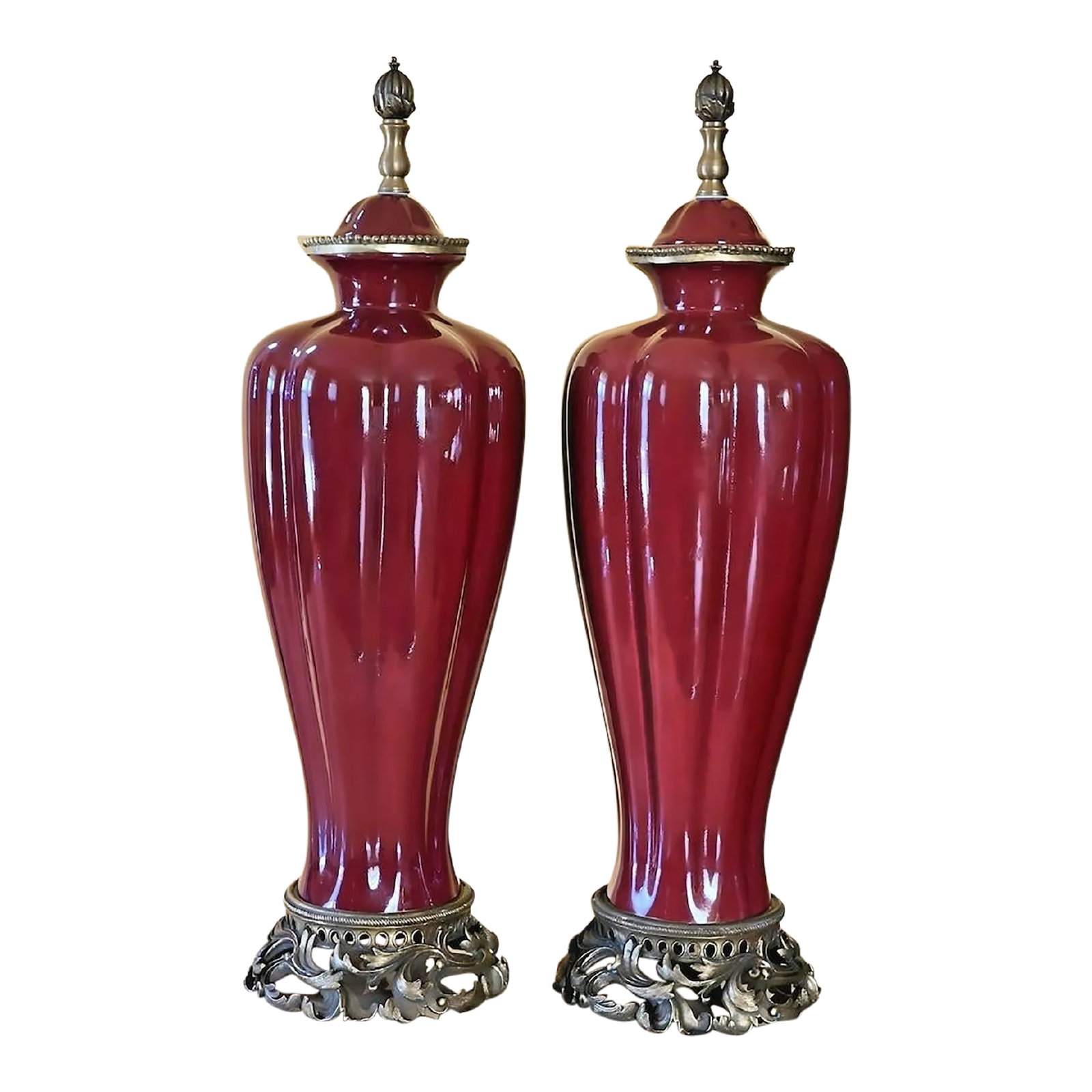 Vintage Sang De Boeuf Vases - Pair of Oxblood Red Ceramic Lamp Bases With Bronze Detailing by Damini: This exquisite pair of vintage Sang de Boeuf vases has been beautifully crafted in a striking deep oxblood red glaze that showcases the signature glossy finish of this traditional Chinese style. The