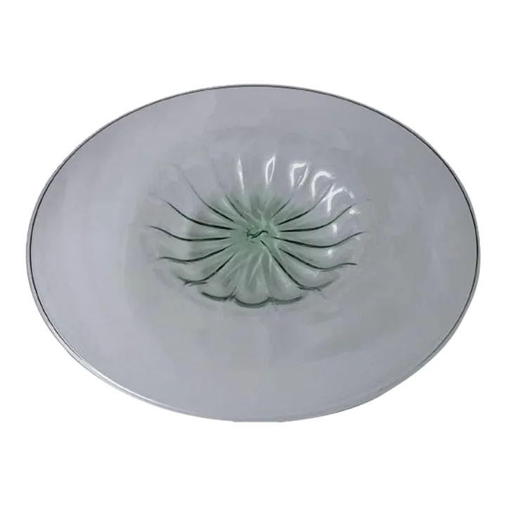 Vintage Murano Costolato Saucer: Offered for sale is a Large plate in costolato (ribbed) verdino (light green) glass in the manner of Napoleone Martinuzzi. Murano, 1940s. H. 2.375; Diam. 18.25 in. Excellent Vintage Condition. Very