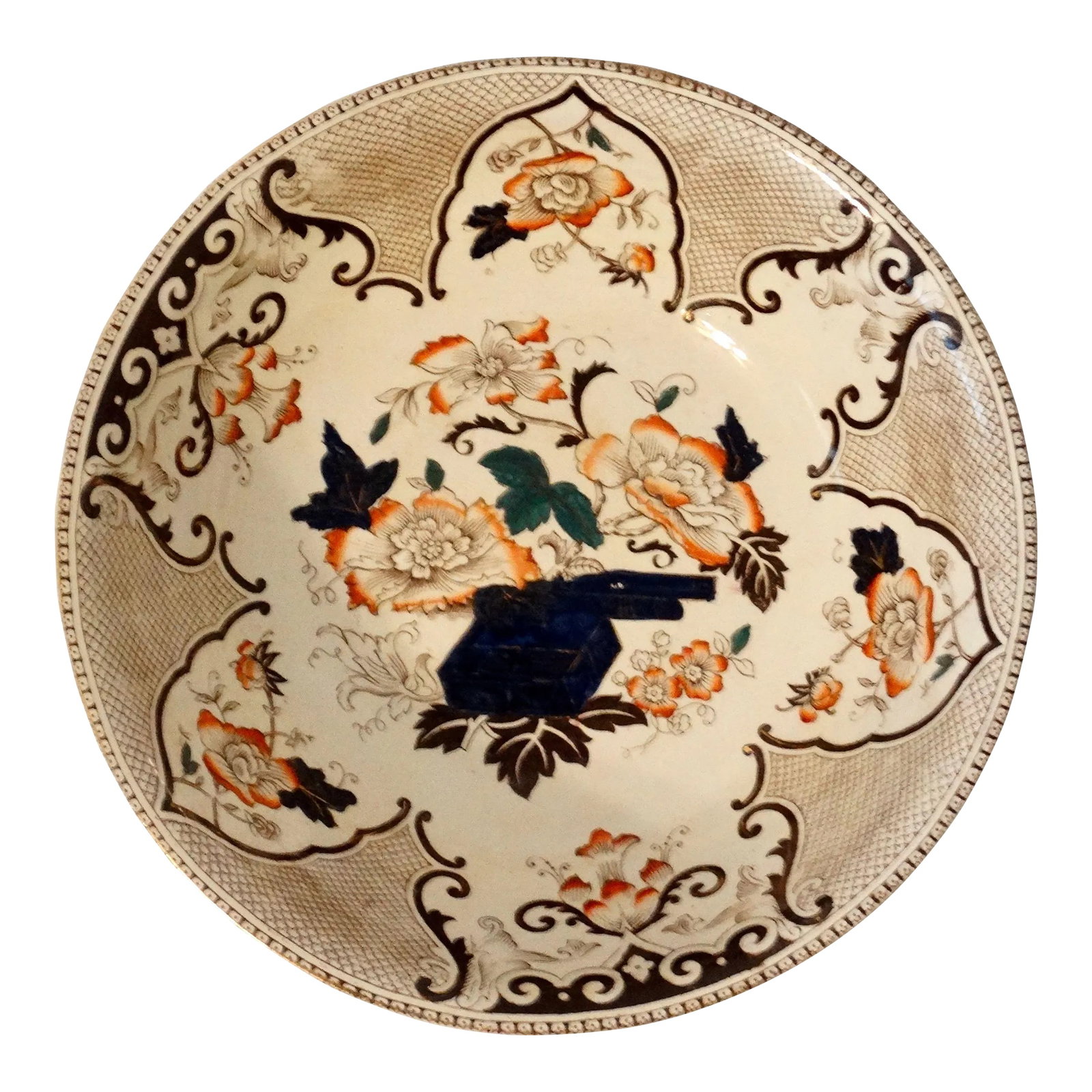 19th-Century English Imari Style Bowl 14.75" Diameter: Large 19th-Century English porcelain bowl in the Imari style. Circa 1870, it is hand painted with a Japanese design with lovely peony flowers, swags and flourishes. It has a delicate cross hatching de