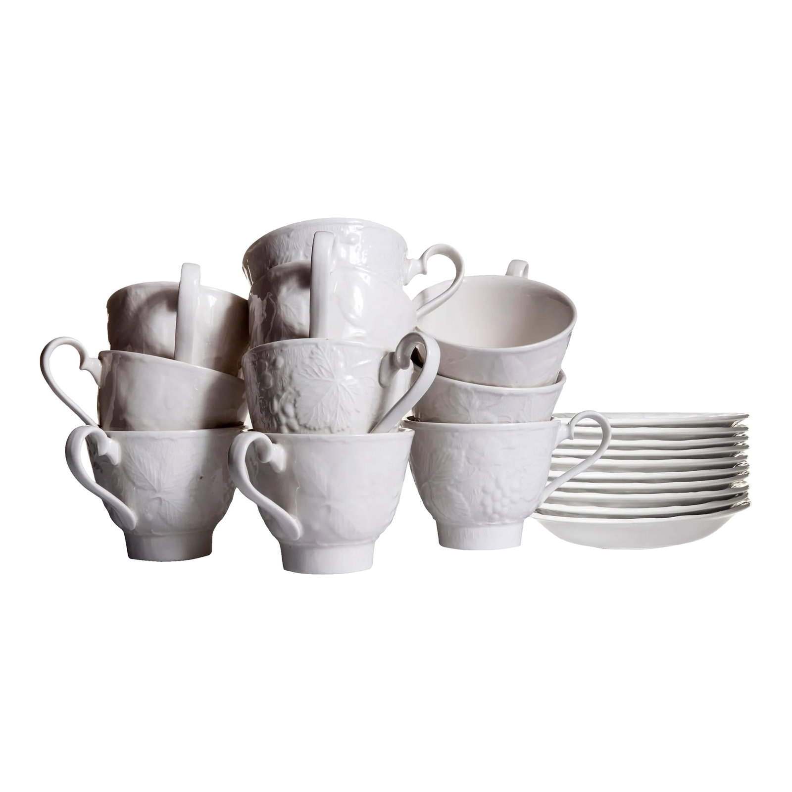Burgess & Leigh English Ironstone Footed Teacups & Saucers Set/9: Burgess & Leigh English Ironstone teacups & saucers in the Davenport pattern with embossed strawberry and grape leaf design. Set of 10. Cups; 3.5"D 5W" 3.5H" Saucers; 1"H 5.75x 5.75W" Condition: