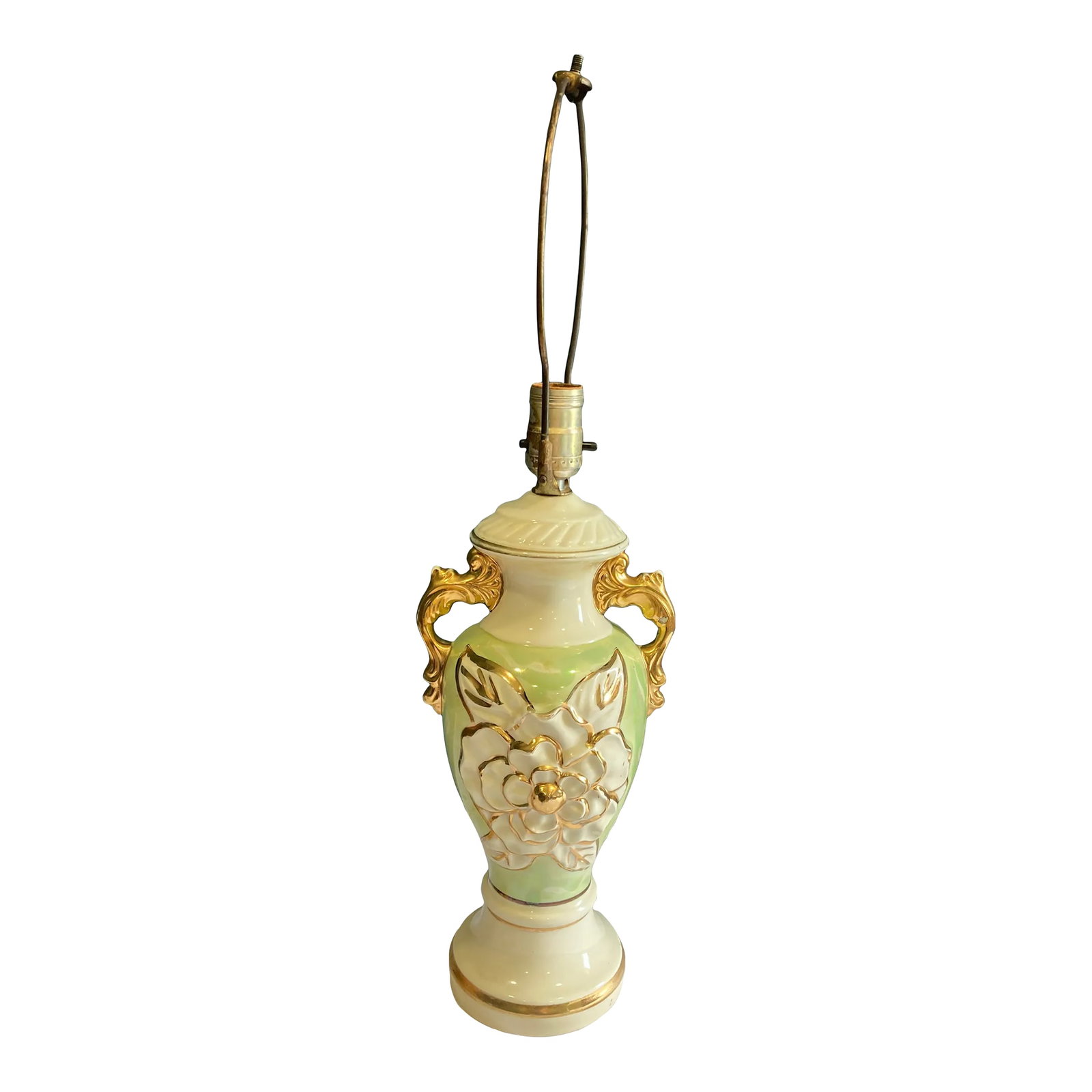 1940's Hand Painted Green & Gold Urn Lamp: This hand-painted ceramic urn lamp features a lovely green and gold floral motif on an off-white base. With its elegant form and soft color palette, this piece blends Victorian delicacy with Art Deco 