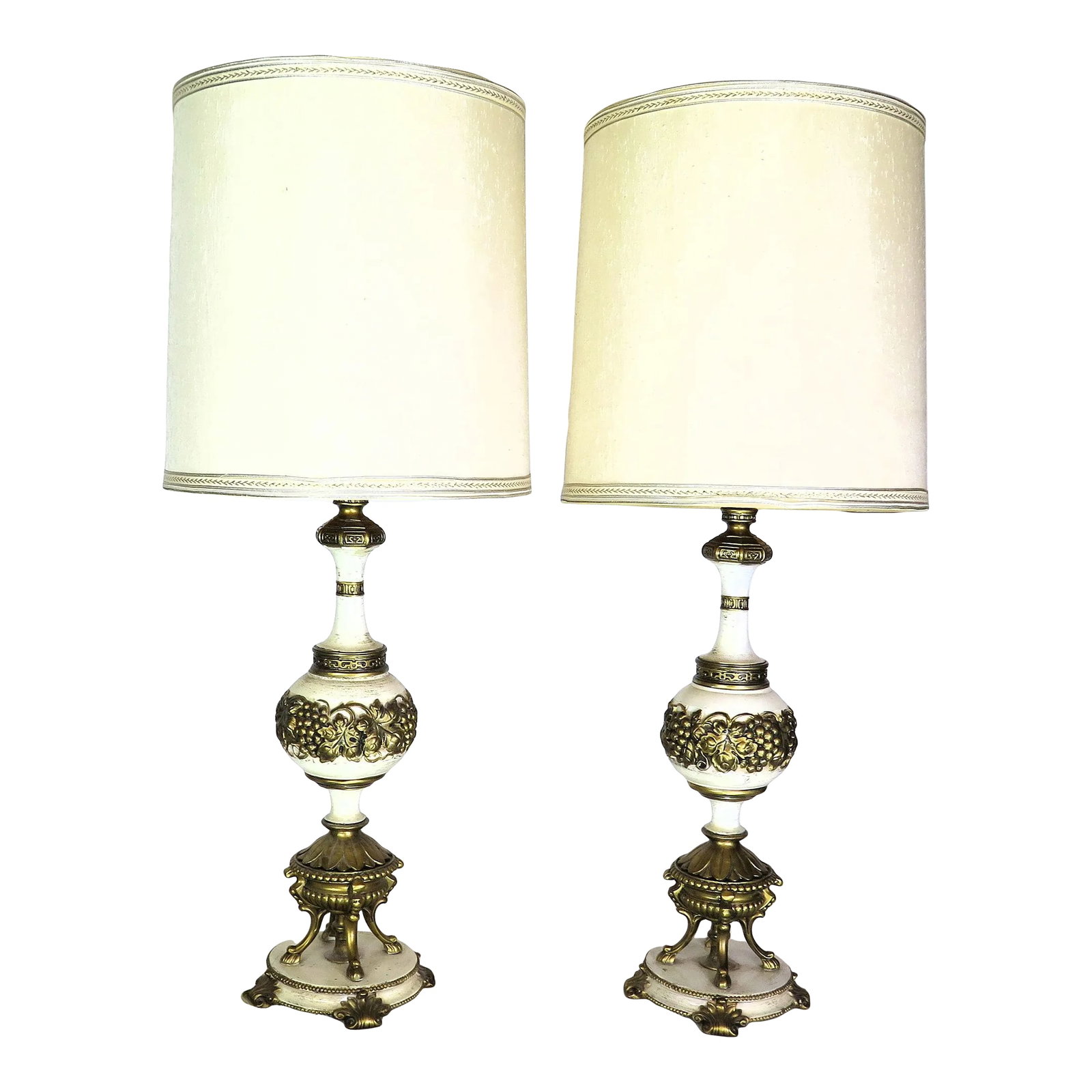 Hollywood Regency Italian Style Brass and Enamel Lamps/A Pair: These unique lamps have the Italian grapes and grape leaf motif. The brass claw feet sit atop the round enamel and brass base. I found these lamps at a shop in Las Vegas at a shop called Patina. Condi