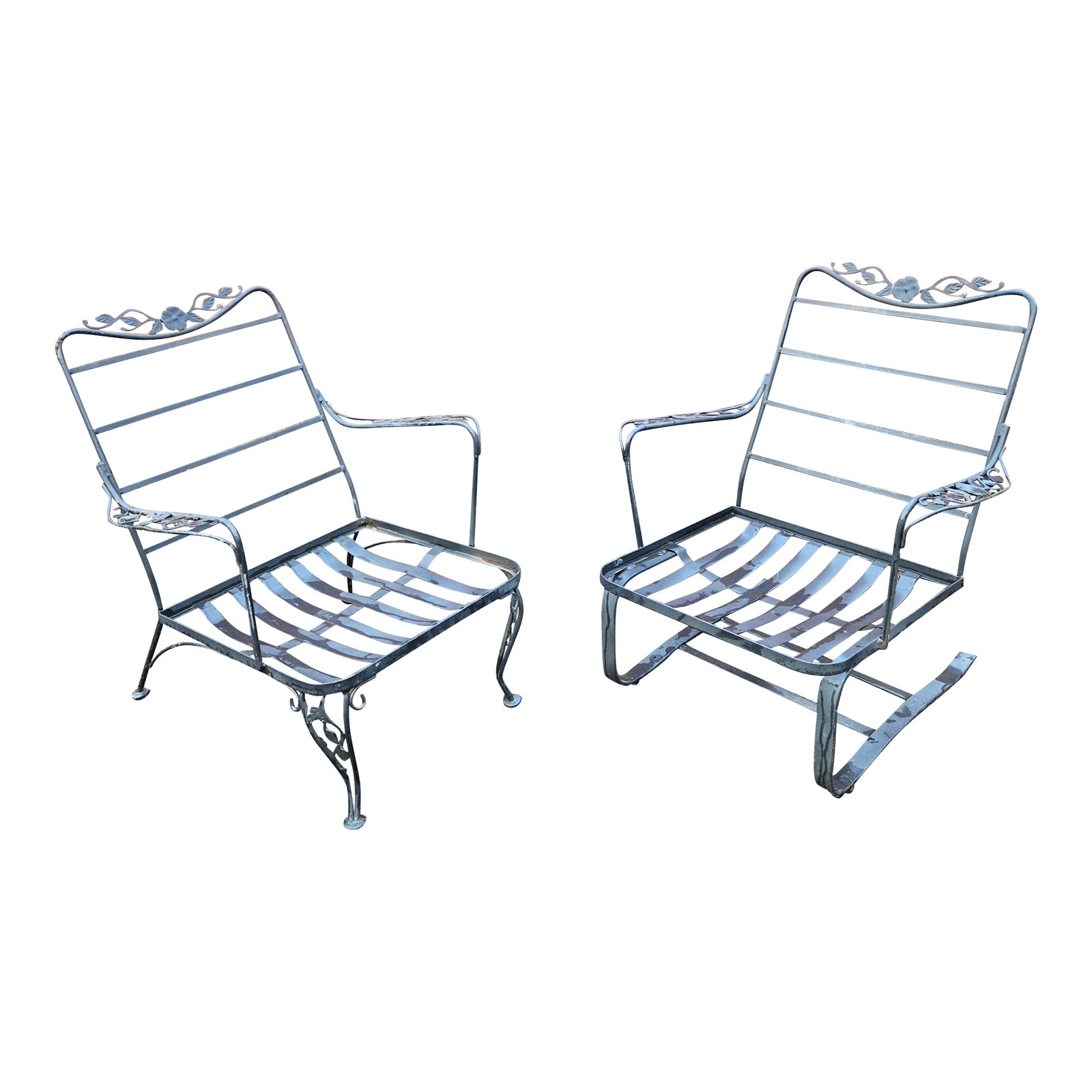 Vintage Wrought Iron Patio Chairs - Set of 2: This is a beautiful set of vintage patio lounge chairs by Woodard, a renowned brand in outdoor furniture. The set features a stationary chair and a "Wind Flower" pattern. This wrought iron set is perf