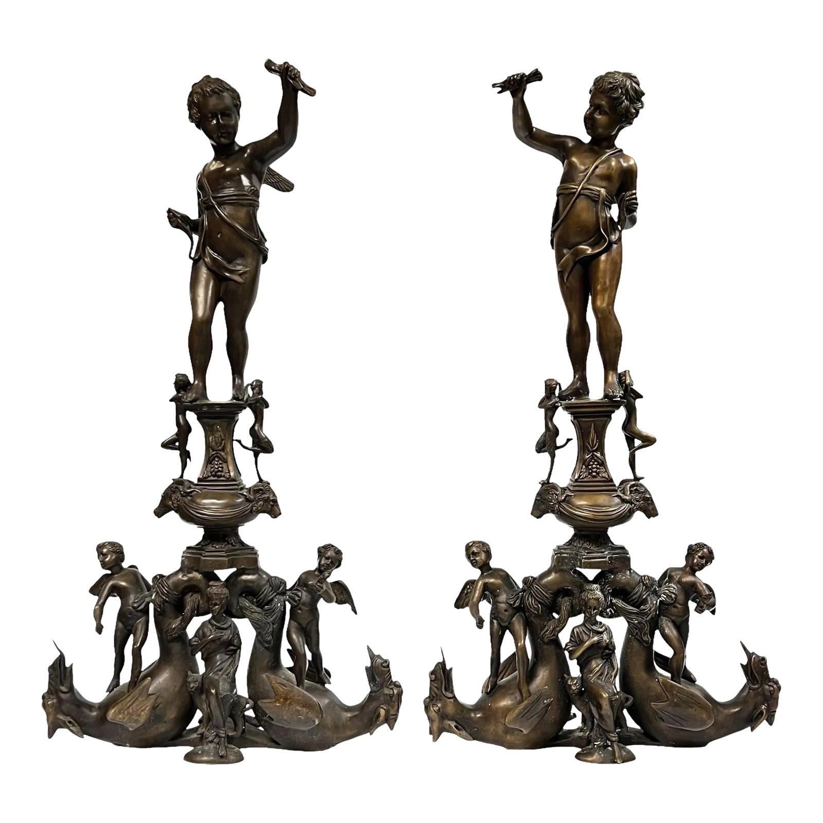 Italian Bronze Chenets in Renaissance Style - A Pair: Pair of figural bronze andirons depicting a variety of mythological figures, including cupids, lions, rams, dragons and gargoyles. Condition: Alterations: Unknown Imperfections: Some Imperfections Con