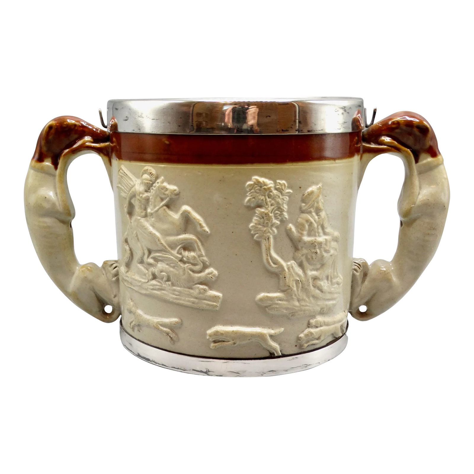 19th-C English Traditional Salt Glazed With Silver Collar & Whippet Dog Loving Cup / Vessel: Large antique English salt glazed hunting cup with handles in the form of whippet dogs. It has been embellished at the top rim and at the bottom edge with a lovely heavy band of silver. It is a