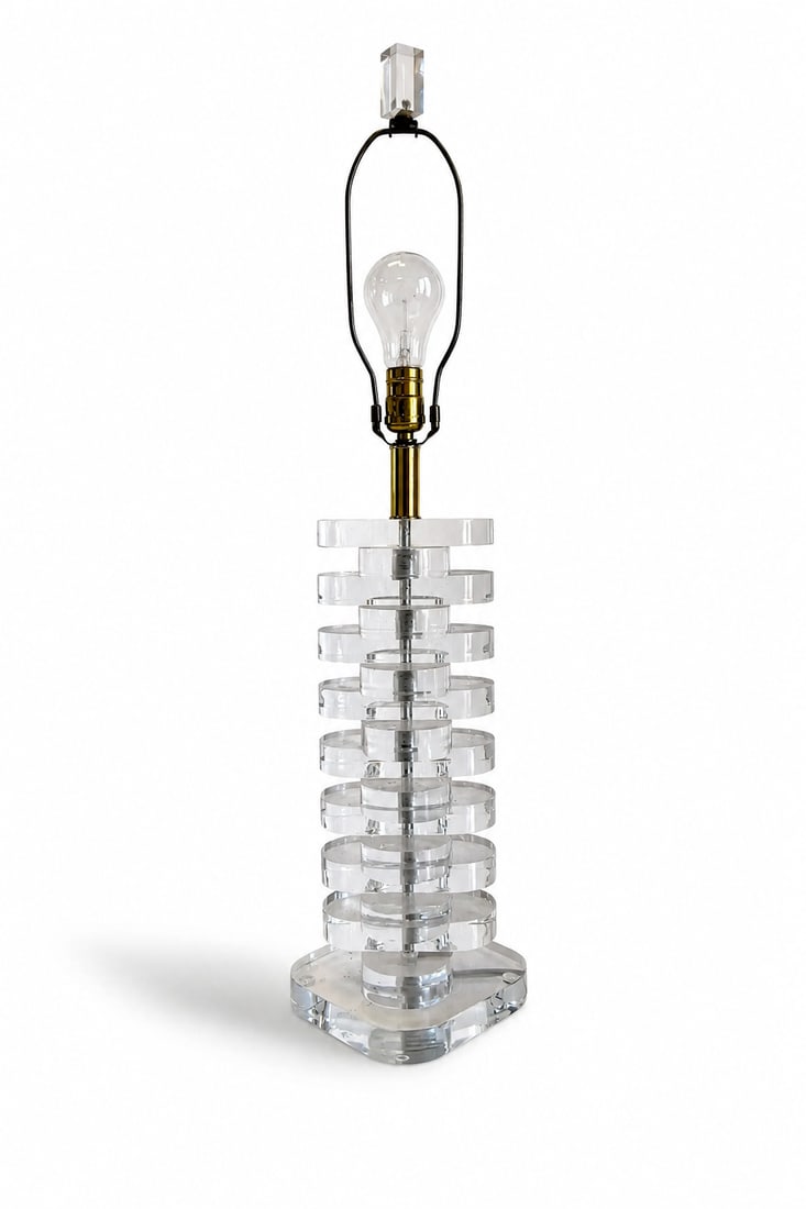1970s Multi Stacked Lucite Table Lamp: 1970s vintage lucite table lamp. This piece has thick, multi stacked lucite blocks. Perfect piece to add a touch of the past in any living space. 32 height 7 deep 7 wide Condition: Alterations: Origin