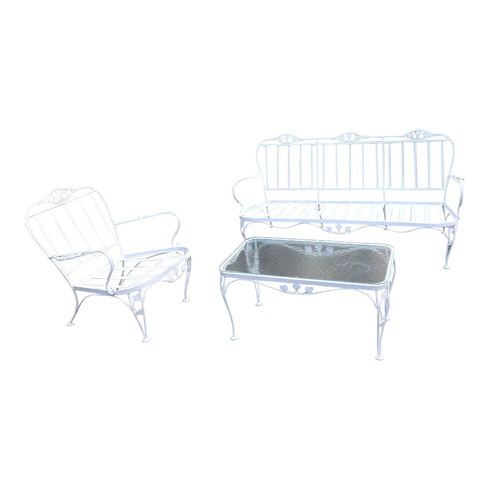 Vintage Wrought Iron Outdoor Patio Seating: Add a touch of vintage charm to your outdoor space with this beautiful wrought iron patio furniture set from Woodard. The set includes a three-piece lounge set with a white arm chair with X back and