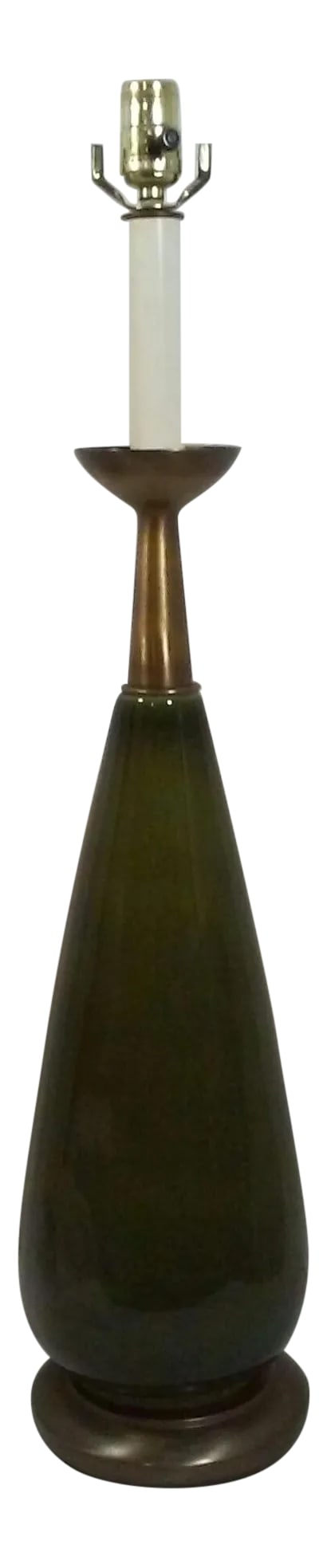 Tommi Parzinger Style Tapered Ceramic Table Lamp: A tall and sultry tapered olive green ceramic table lamp with burnished brass flying saucer shape tapered top. This large scale vintage lamp was great lines and in a relevant color for today' s decora