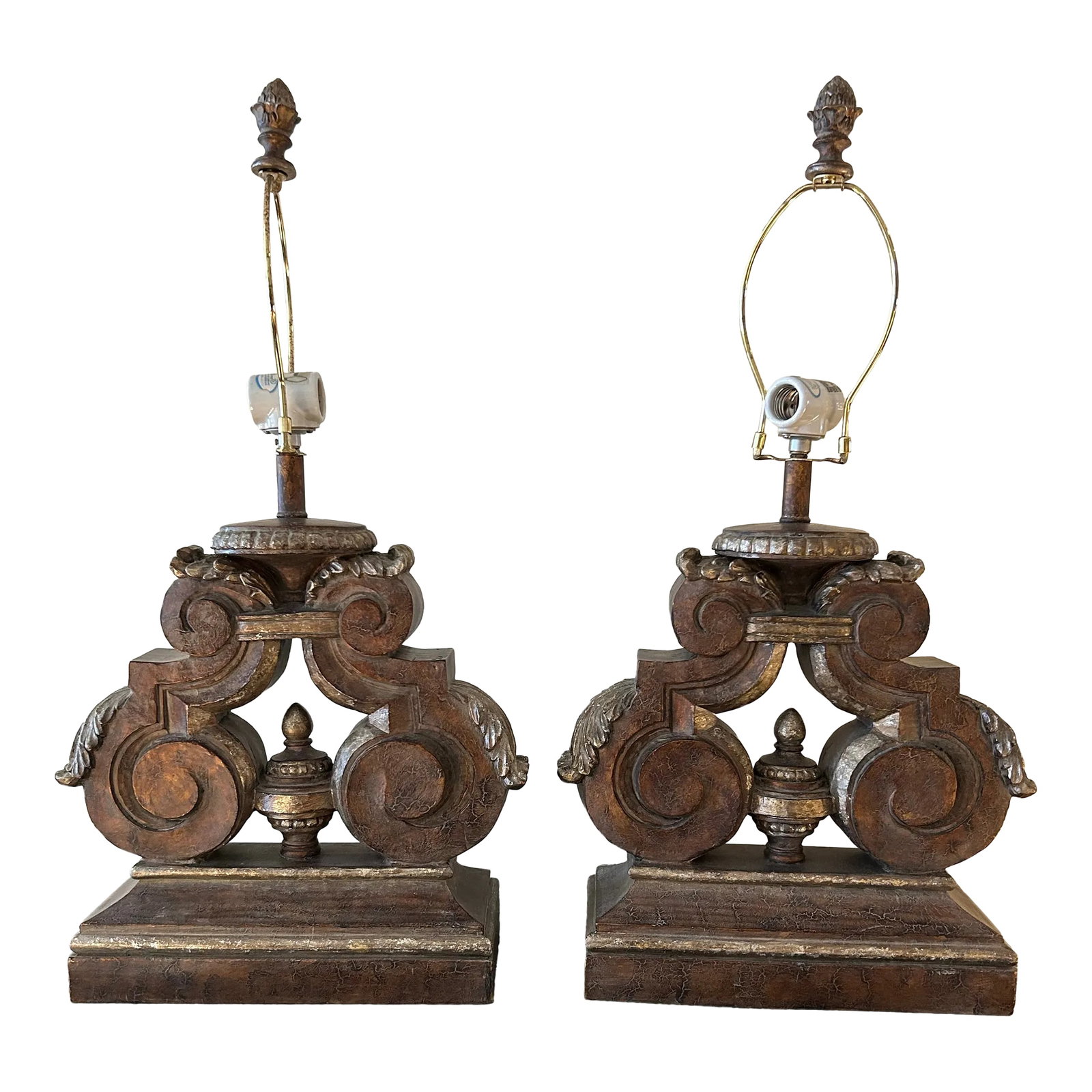 1980s Pair of Neoclassical Style Lamps: Chic pair of table lamps crafted in plaster, having an eccentric composition with classical scrolls and acanthus leaves. Condition: Alterations: Original Condition Unaltered Imperfections: Some Imperf