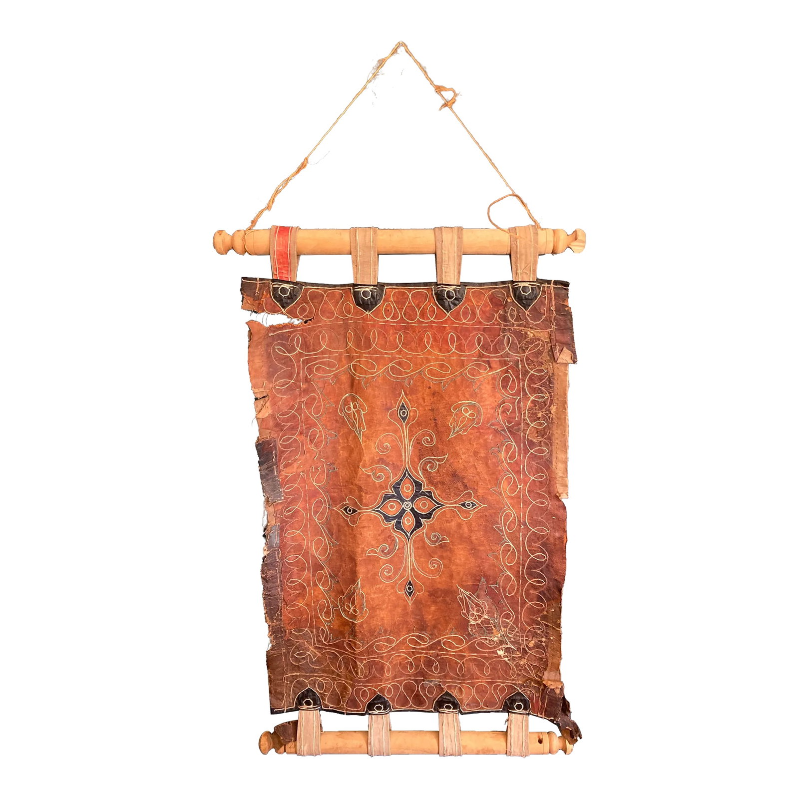 Vintage Handcrafted Leather Folk Art Wall Hanging: A richly textured vintage leather wall hanging featuring hand-stitched decorative motifs and mounted on turned wooden dowels. The earthy tones, visible handwork, and aged patina give this piece a stro