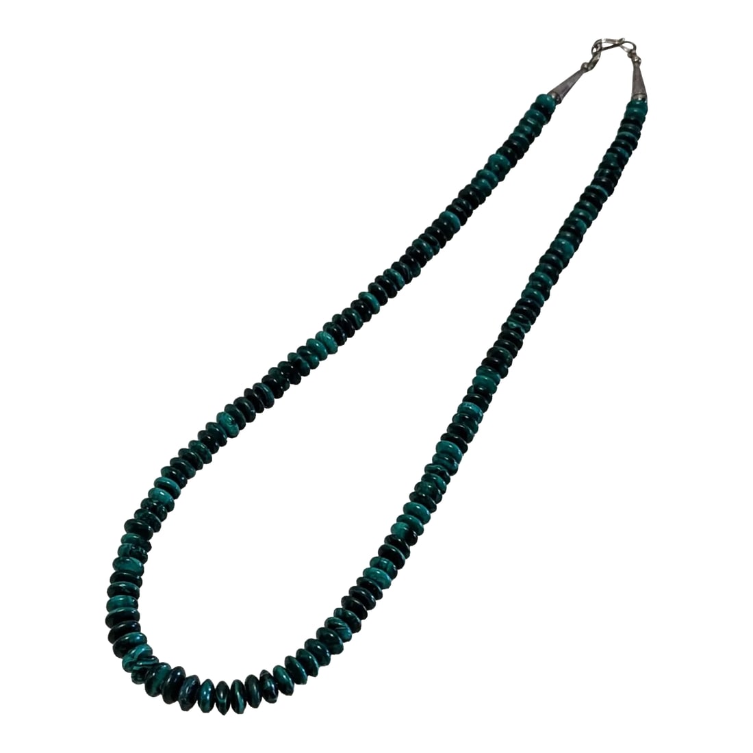 70s Malachite Hand Beaded 21" With a Mid Century Modern Clasp: This is part of Chairish's Costume Jewelry assortment. Beads are like rounded disks of similar size, tapering slightly towards the clasp. Pure Malachite beaded 21.5 inch length. Purchased in the 70's