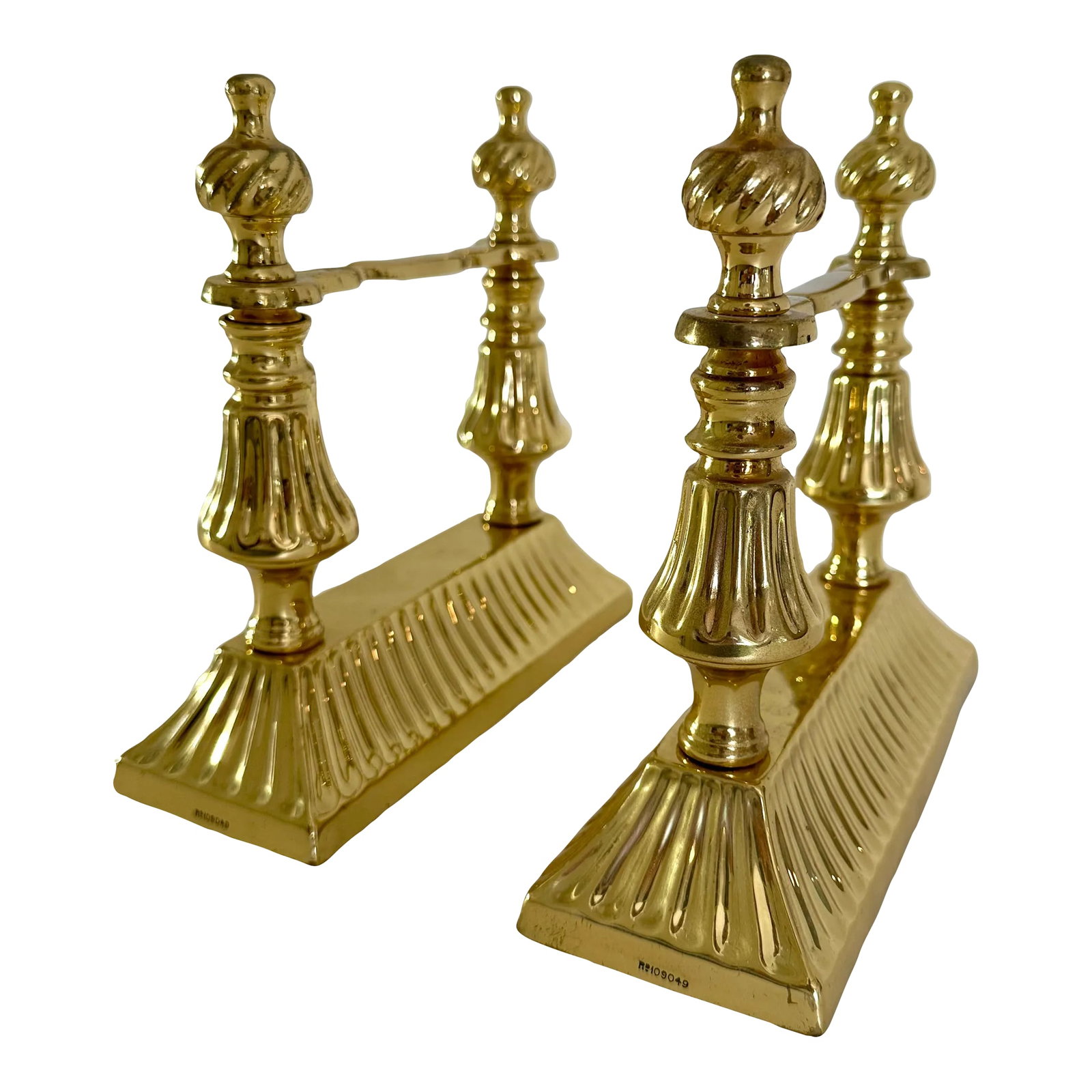 Pair of Late 19th Century Victorian Brass Aesthetic Movement Fire Dogs: Pair Victorian Aesthetic Movement brass fire dogs. Marked on bases RB109049. Weighted bases. Measures 2-7/8" W X 7-7/8" D X 7-3/4" H. More recently cleaned & polished with warm brass patina. Antique
