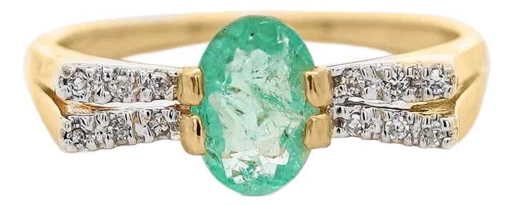 0.86 Carat Vibrant Green Oval Cut Emerald & Diamond in 14ky Gold Statement Ring, Size 7.25: 14KY- EO-0.86ct (7.8 x 6mm) / D-0.19ct / 2.59 grams / Size 7 1/4 A vibrant 0.86-carat oval emerald is elegantly framed by sparkling diamonds in this 14K yellow gold ring, offering a timeless balance