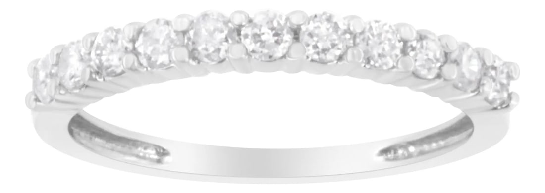 IGI Certified 1/2 Cttw Diamond 10K White Gold Prong Set Fluted Band Style Ring (I-J Color, I2-I3 Cla: Elegant and timeless, this IGI certified 10K white gold diamond band features 0.5 carat total weight of round, brilliant cut diamonds prong set into the face of the slender band. The ring features 11