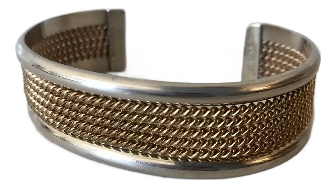 Navajo Tahe Sterling and 12k Gf Braided Cuff Bracelet: This lovely Native American Tahe Sterling and 12k Gf Braided Cuff Bracelet will soon be a "go-to" in your jewelry collection. This beautiful cuff by Navajo artist duo Z. Franklin and Verna Tahe is a v