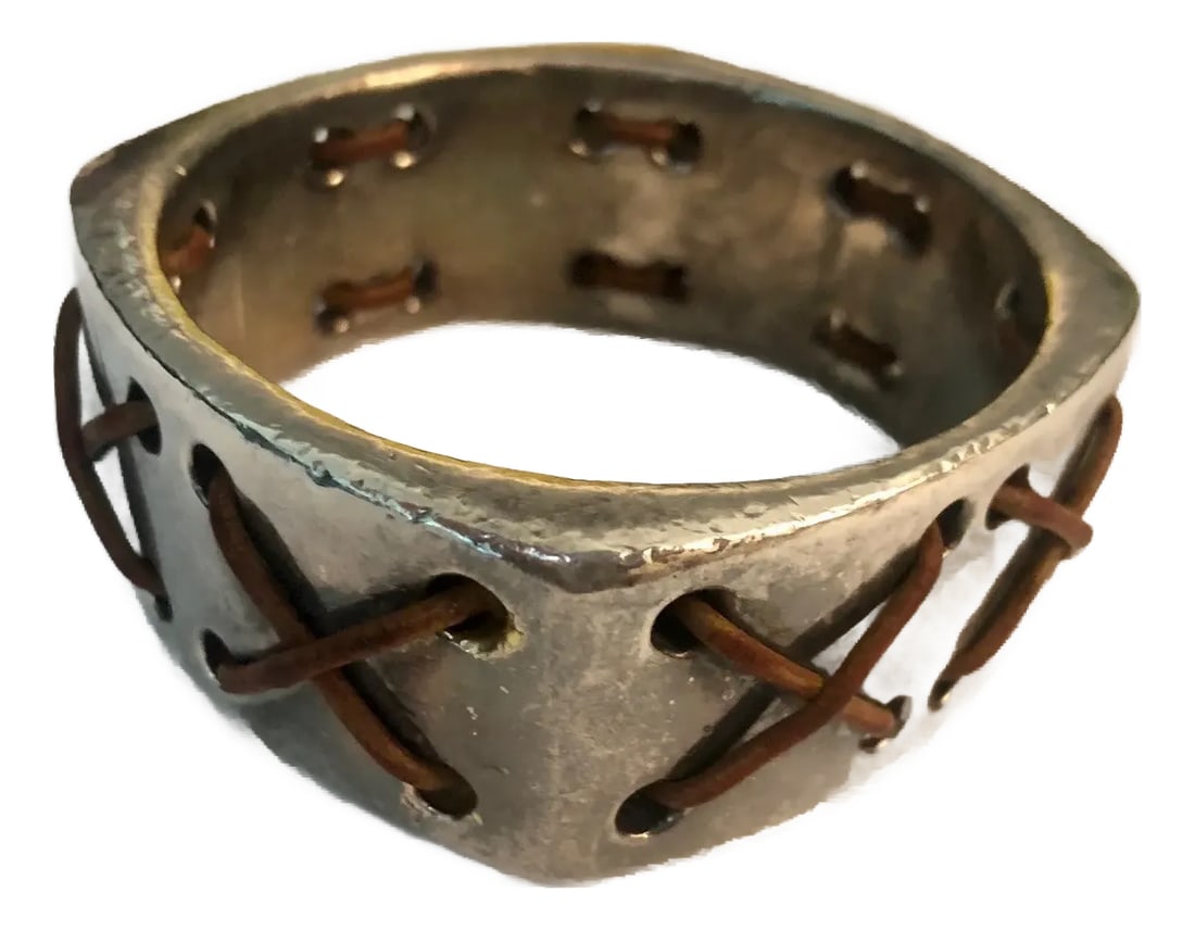 Vintage Santa Fe Leather and Silver Bangle: This fantastic Vintage Santa Fe Leather and Silver Bangle will garner lots of oohs and aahs -- from Aspen to Santa Fe to Nantucket. So different and unique, this stylish southwestern-style bangle