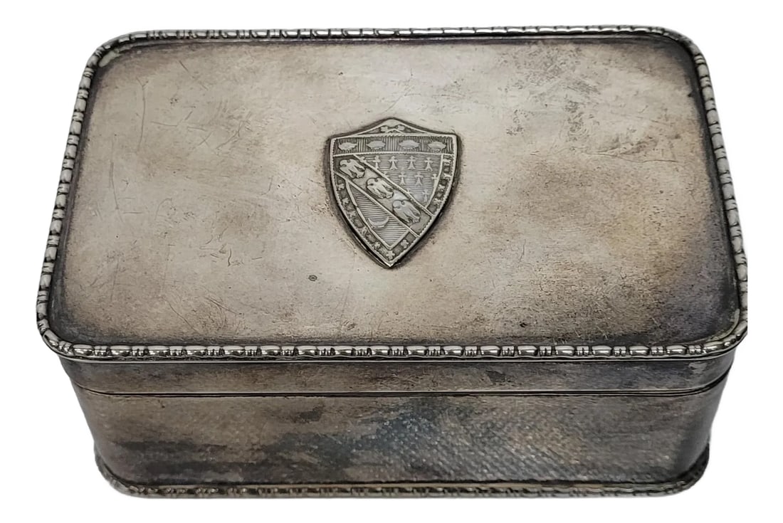 1930s Vintage Snuff Tobacco Stash Bernard Rice Son Brs Silver Plated Box Marked With Coat of Armor F: Nice Nickle Silver Box marked BRS with a Family Crest Medallion on top. Unique piece, in good condition with tarnish, wear and scratches. Measures 2"h x 3"D x 4.5" W, numbered 6277 BRS is BERNARD