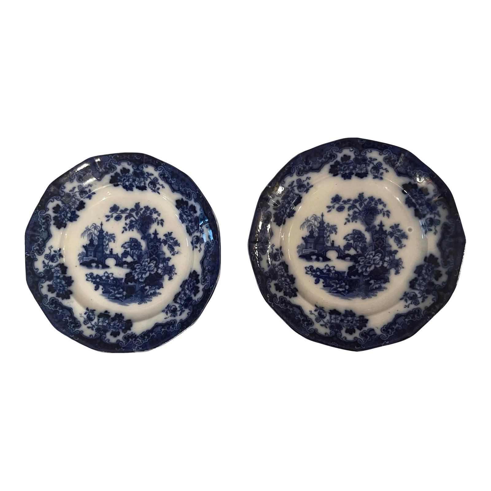 Late 19th Century Blue Flow Sobraon Plates- Set of 2: Mid 19th Century British Sobraon Flow Blue Transferware 9 3/8 Inch Plate Antique mid 19th century British earthenware plate. Decorated in the Sobraon pattern in flow blue transfer. Marked Sobraon in b