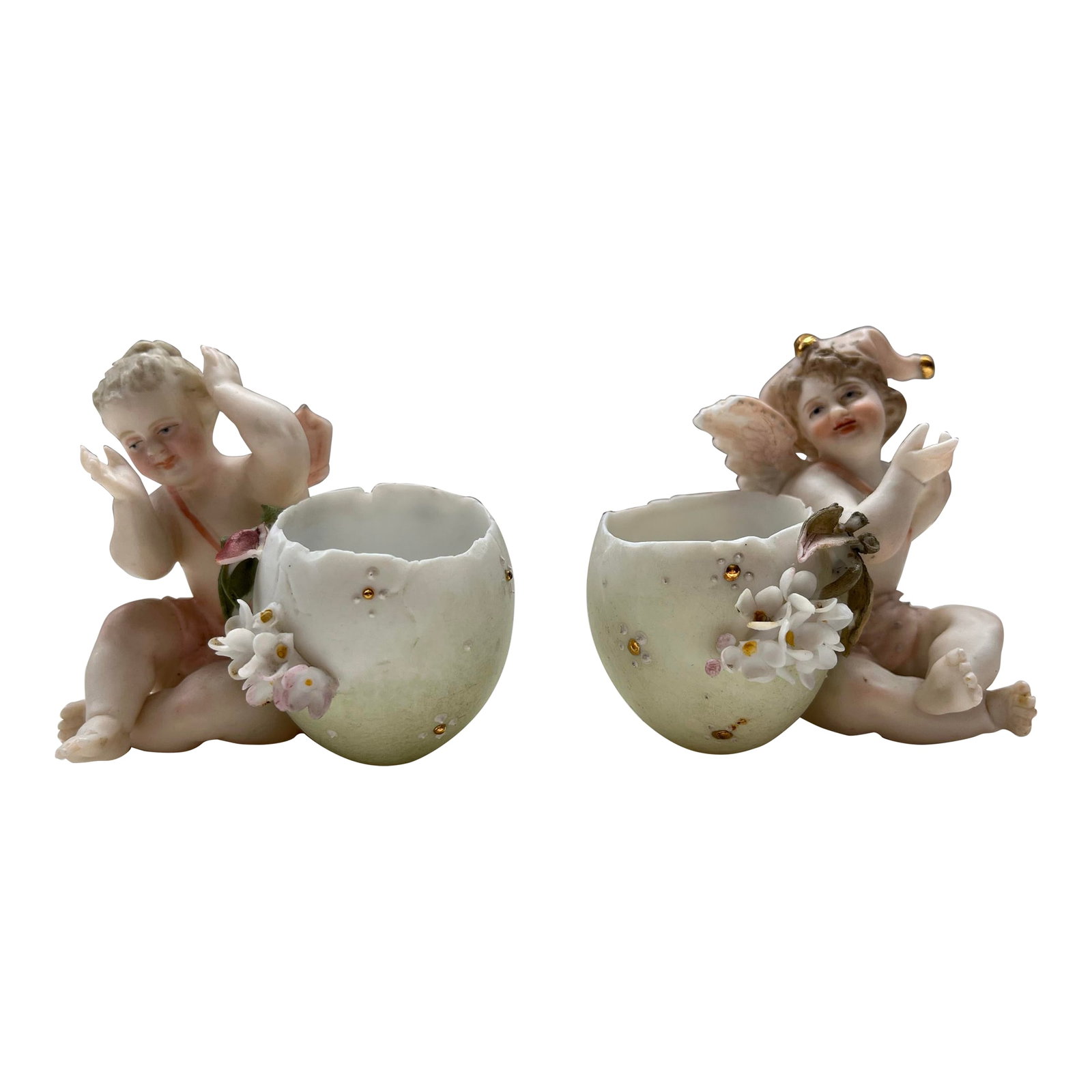 Antique Pair of Capodimonte Bisque Cherub Figurines: Rare Capodimonte Porcelain Pair Cherubs with Eggcups, c. 1900. Fine sculptural details and hand painting with bisque finish. Marked "43" and "17", stamped "32". A beautiful unique set. Condition: