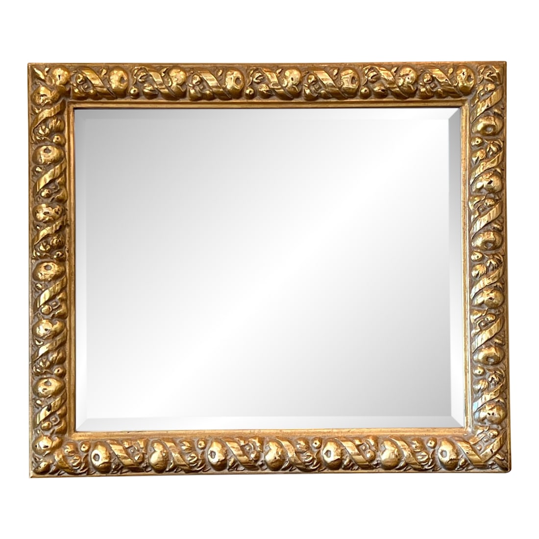1980s Della Robbia Style Carved Gold Gilt Mirror: Late 19th Century gold mirror is an exquisite example of a 15th Century della Robbia style frame complete with a running garland of fruit, flowers and ribbons. Made by Mexican artisans in the early
