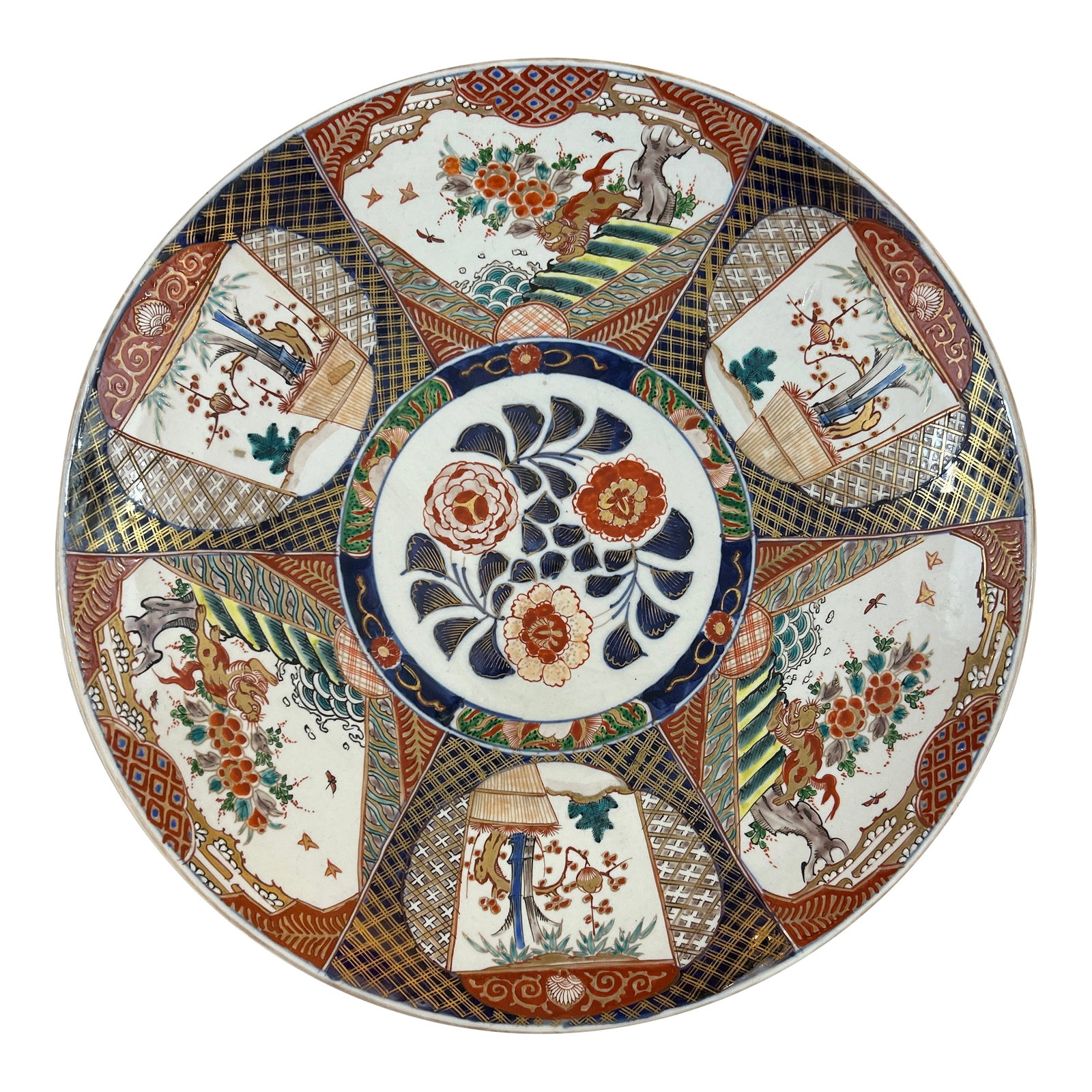 Asian Large Ceramic Platter: Large Asian ceramic platter. The platter depicts figures, dragons, flowers and the out of doors. It has markings on the bottom in blue. Condition: Alterations: Original Condition Unaltered Imperfectio