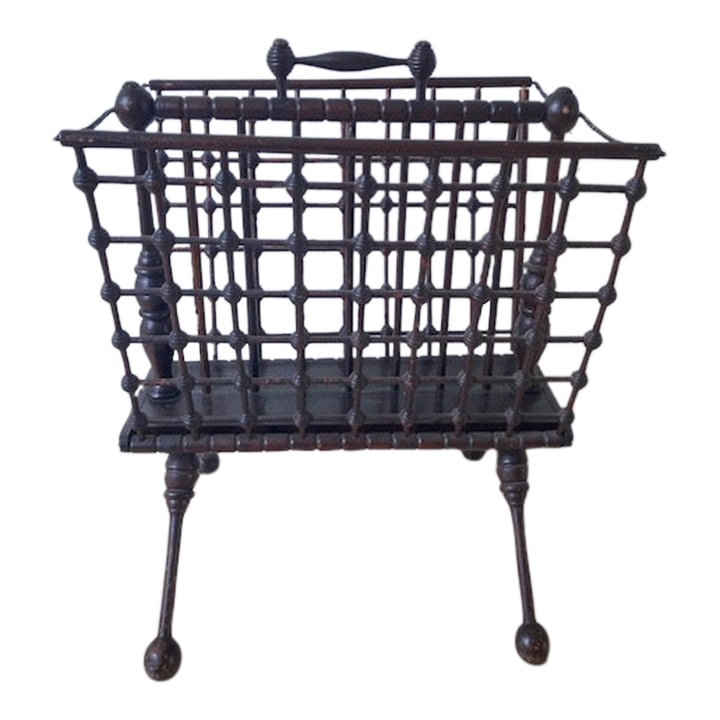 1910s Aesthetic Era Magazine Rack: This is such a beautiful piece of work. An Aesthetic era folding magazine rack in dark wood, with great graphic details and design. In excellent, working condition. Condition: Alterations: Original