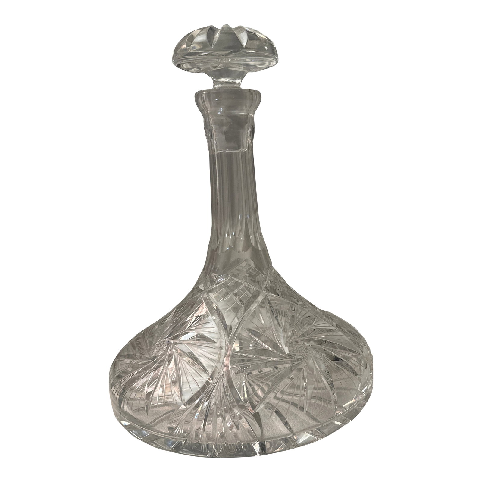 Vintage Ship's Decanter: This is a beautiful mid-century crystal cut ships decanter. It has a brilliant cut finish dating back to circa 1960. It has a beautiful pinwheel motif. It is a full-bodied wine or liquor decanter. It 