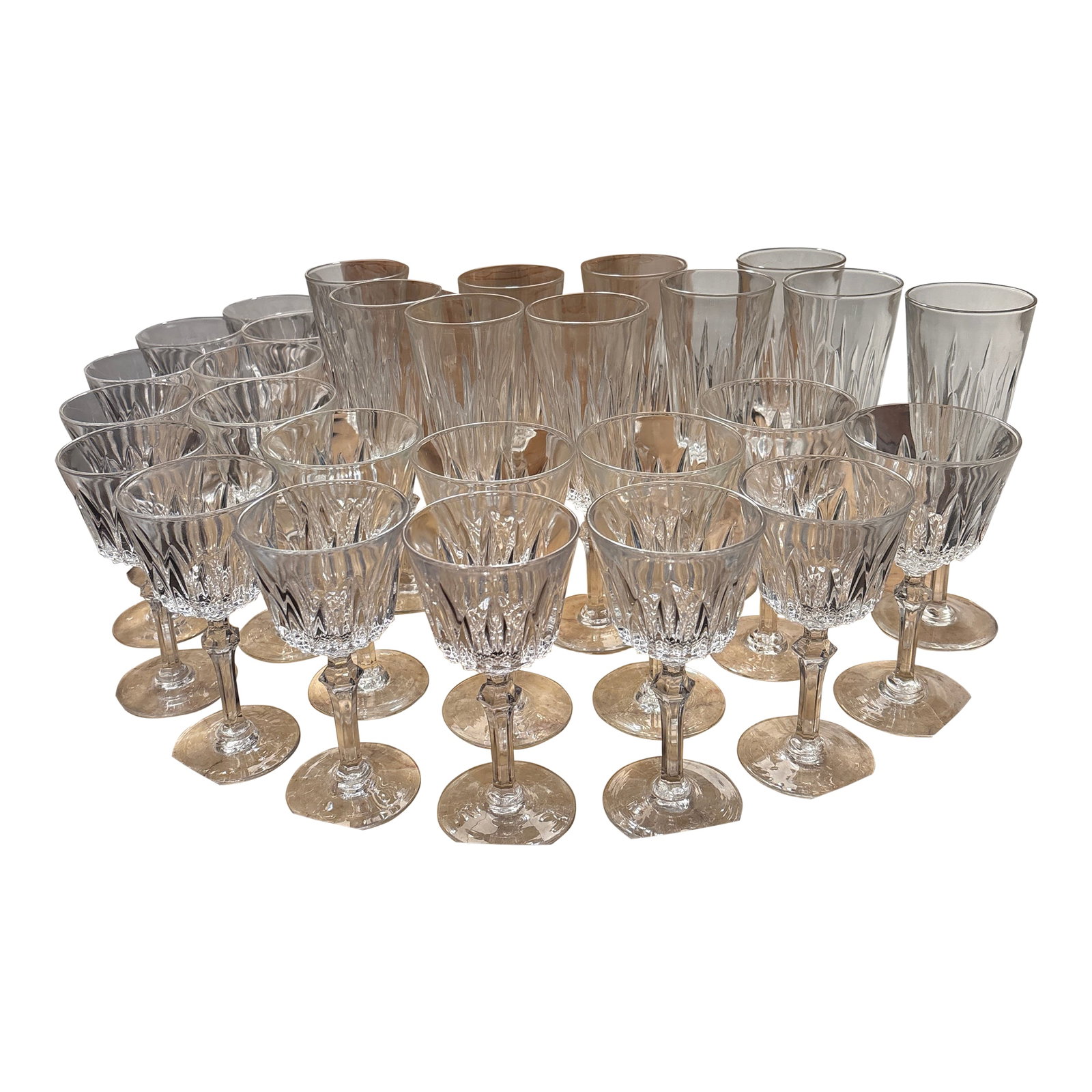 French Antique Crystal Wine Glasses and Champagne Flutes - Set of 28: This beautiful collection of French crystal includes 10 champagne flutes, 10 wine glasses and 8 water glasses from the 1930s or 1940s. These glasses were brought to the United States from France and b