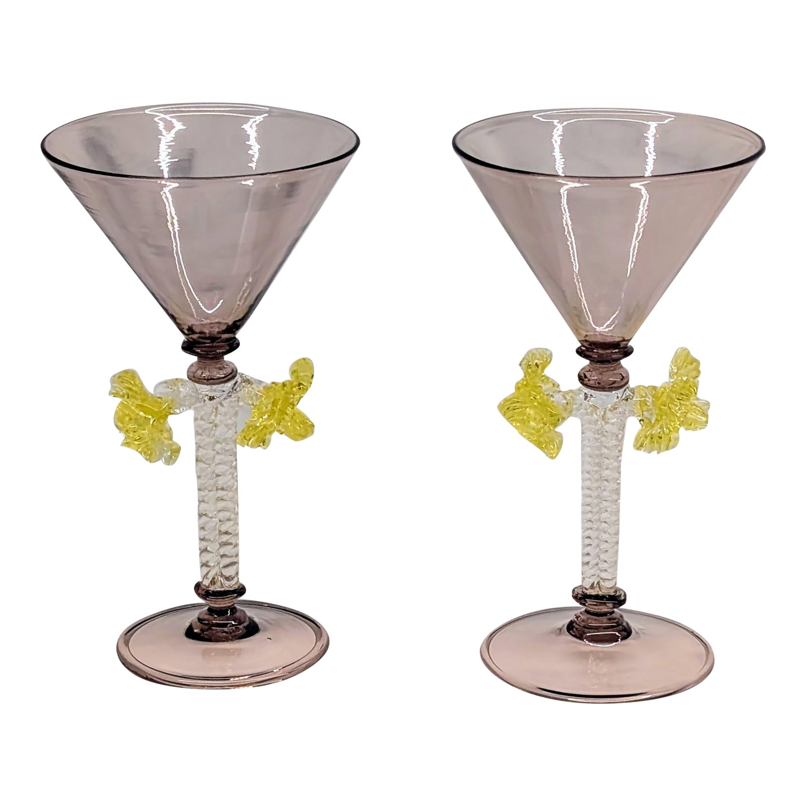 Pair of Mid 20th Century Hand-Blown Murano Martini Glasses Attributed to Salviati With Twisted Stems: A sophisticated pair of hand-blown Murano martini glasses, attributed to Salviati, featuring twisted clear stems with applied yellow prunts and soft amethyst-colored bowls. These elegant glasses exemp