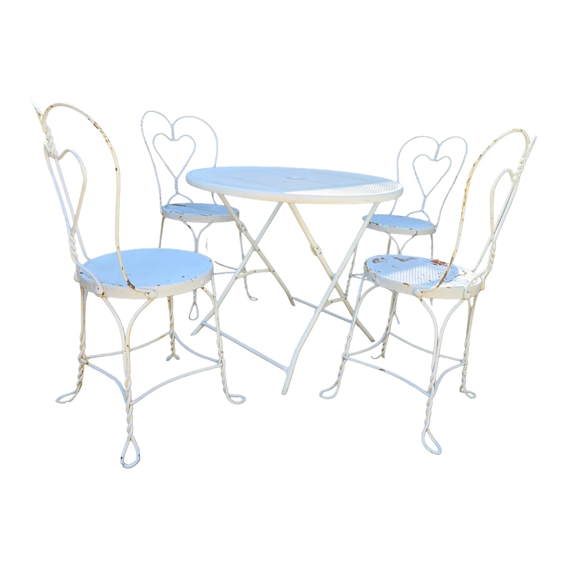 Vintage Wrought Iron Outdoor Patio Table & 4 Chairs: Vintage wrought iron patio furniture brings a timeless charm to any outdoor setting. Whether you're aiming for a cozy retro feel or mixing materials for a unique look, these pieces are always a reliab