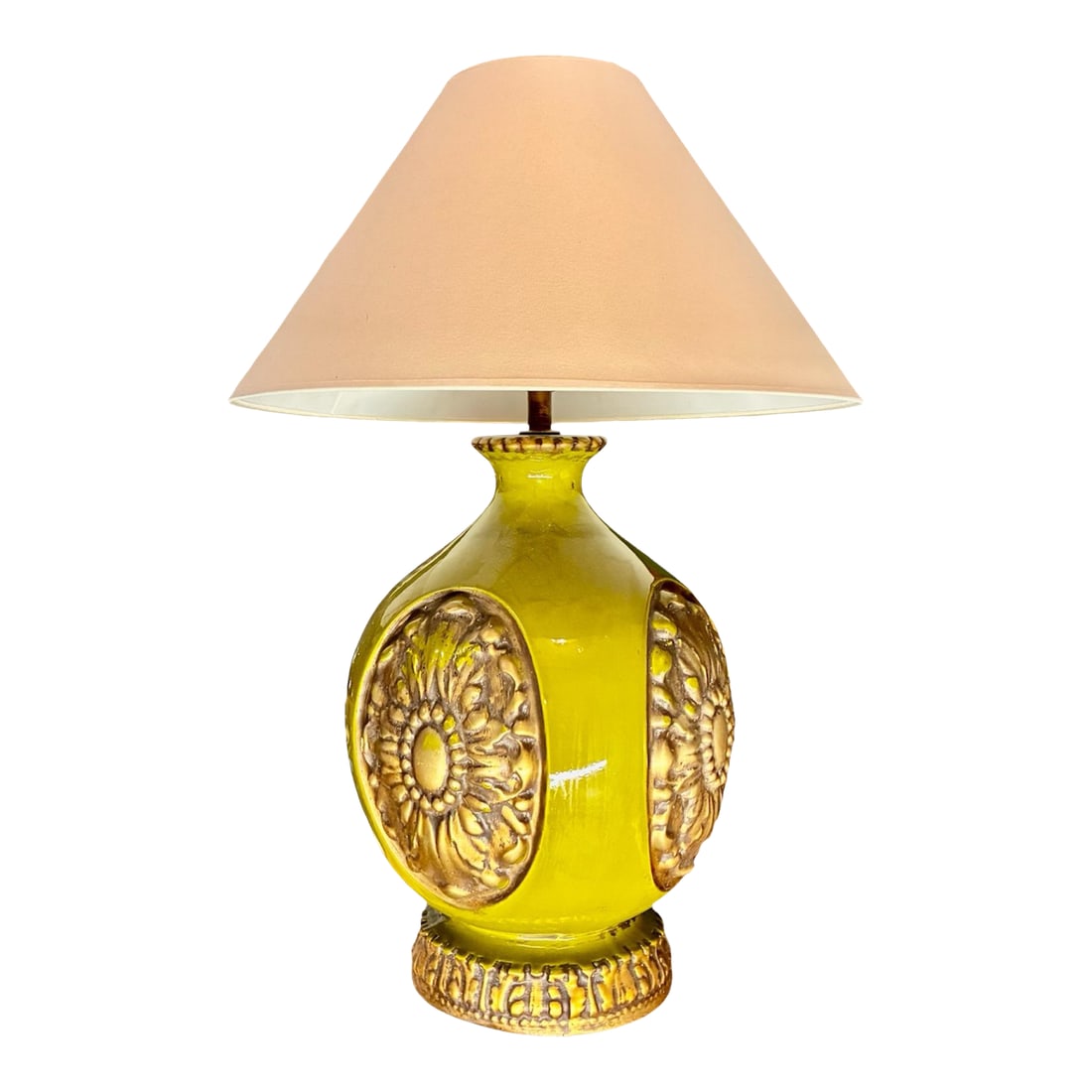 Mid-Century Ceramic Table Lamp With Embossed Floral Medallions: Bring a burst of vintage charm and bold color into your space with this striking mid-century ceramic table lamp. Featuring an eye-catching chartreuse glaze and intricate embossed floral medallion