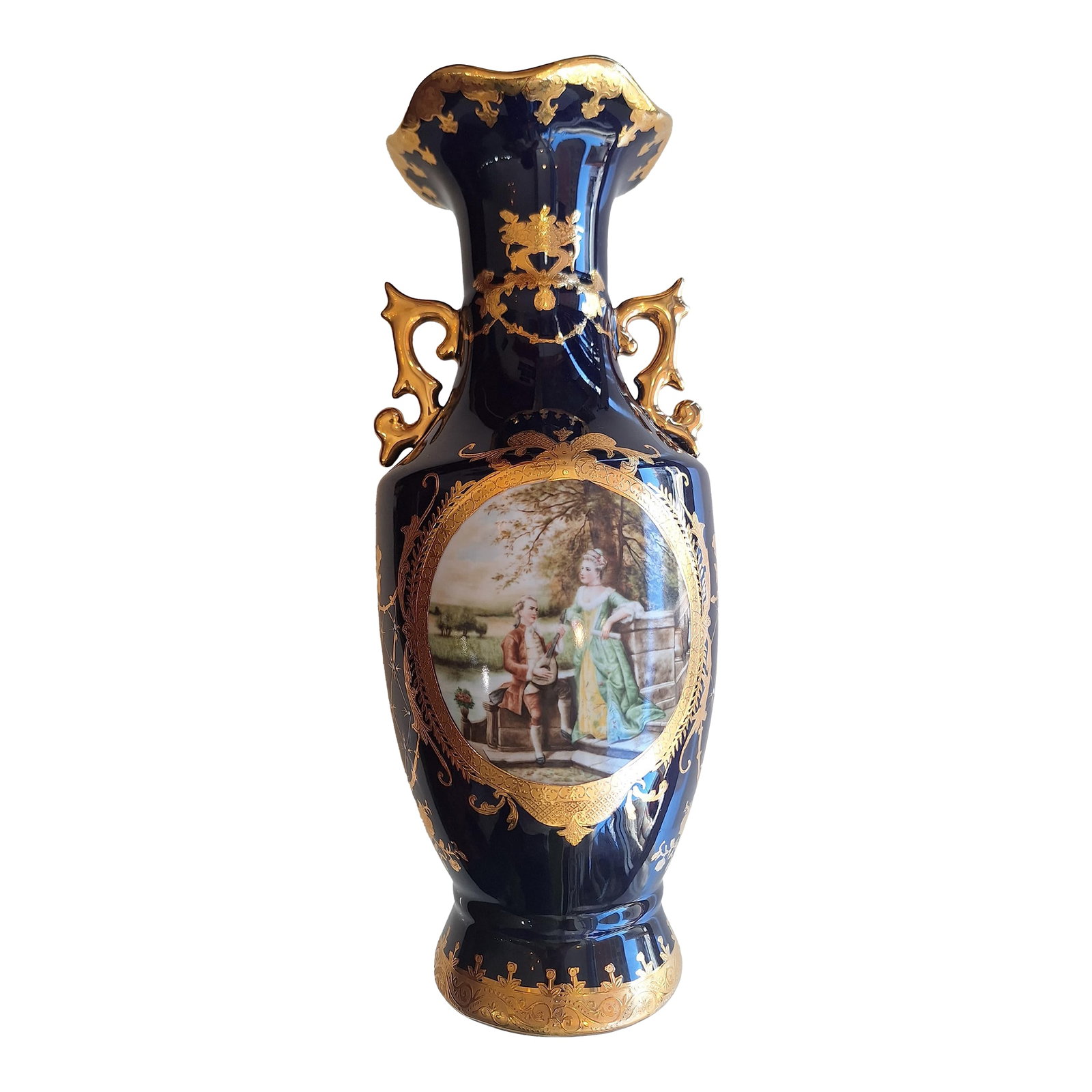 Late 20th Century French Style Vase: Vintage French style cobalt blue gold ornate porcelain vase. The scene depicting a romantic scene with a gentleman playing guitar to his lover near the lake. Condition: Alterations: Original