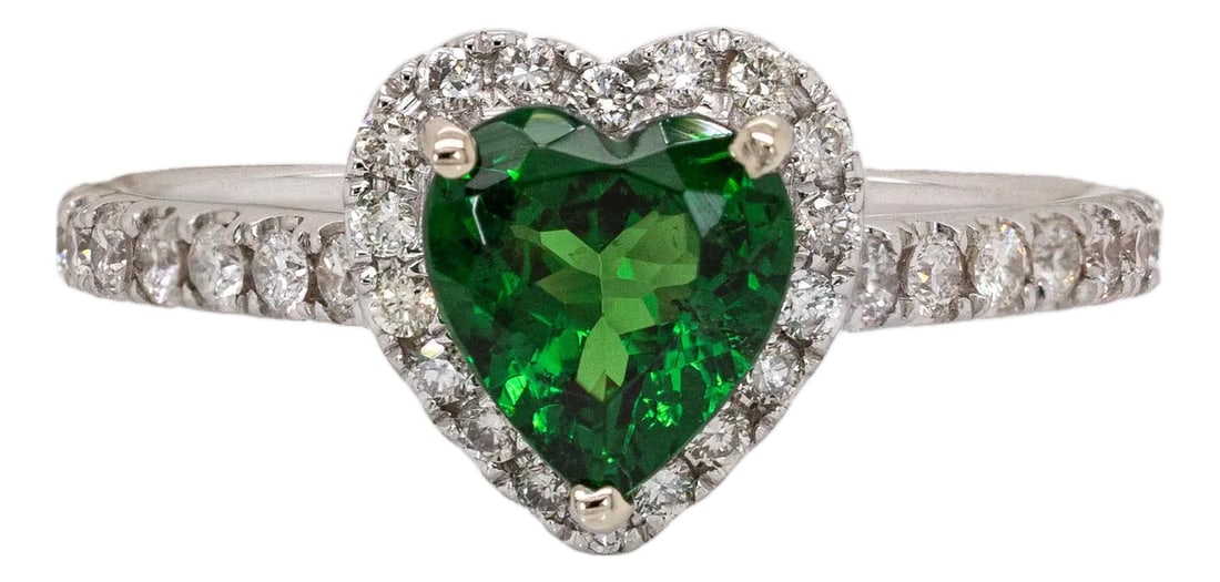 1ct Heart Shape Tsavorite Garnet Ring Size 6.75 With Natural Diamonds: 14k White Gold: This charming ring features a 1.00ct heart-shaped Tsavorite Garnet from Tanzania, measuring 7.1 x 6.6mm. Set in 14k gold (2.41g), the vivid green gemstone is surrounded by 44 sparkling diamonds totali