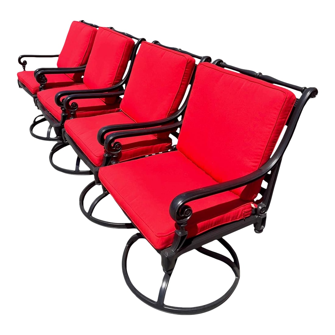 Frontgate "Carlisle" Cast-Aluminum Swivel Rocker Dining Chairs With Red Cushions, Set/4: Set of four Frontgate Carlisle swivel dining armchairs in black powder-coated cast aluminum with lattice seats and X-back/medallion detail. Each chair swivels and rocks on a pedestal base. Includes ma