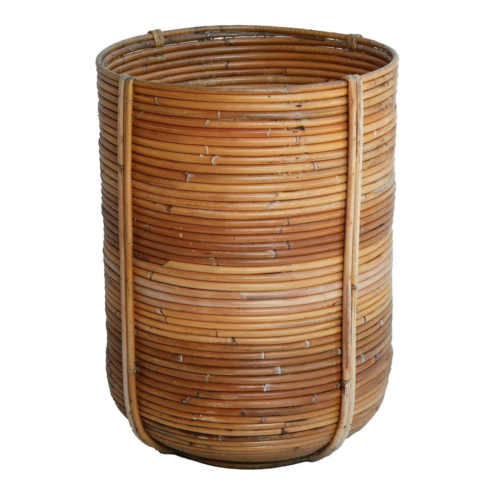 Mid 20th Century Handmade Reed Planter/ Basket: Hand woven reed basket with natural texture and color. Crafted in the mid 20th century, it features an organic silhouette ideal for plants or functional storage. This basket is in very good vintage