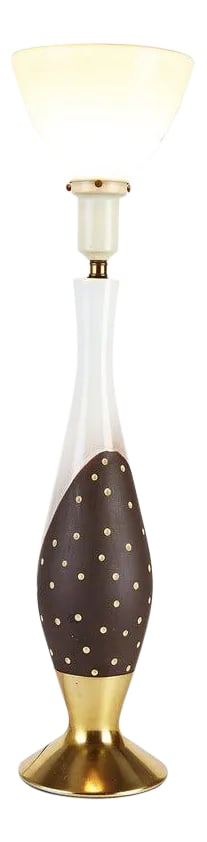 Tall Brown Dots Porcelain Table Lamp With Torchiere Shade: Sleek mid century modern table lamp with white porcelain glaze combined with a brown glaze with polka dots in the ceramic. Sits atop a brushed brass finish pedestal base. The lamp has a reflector upli